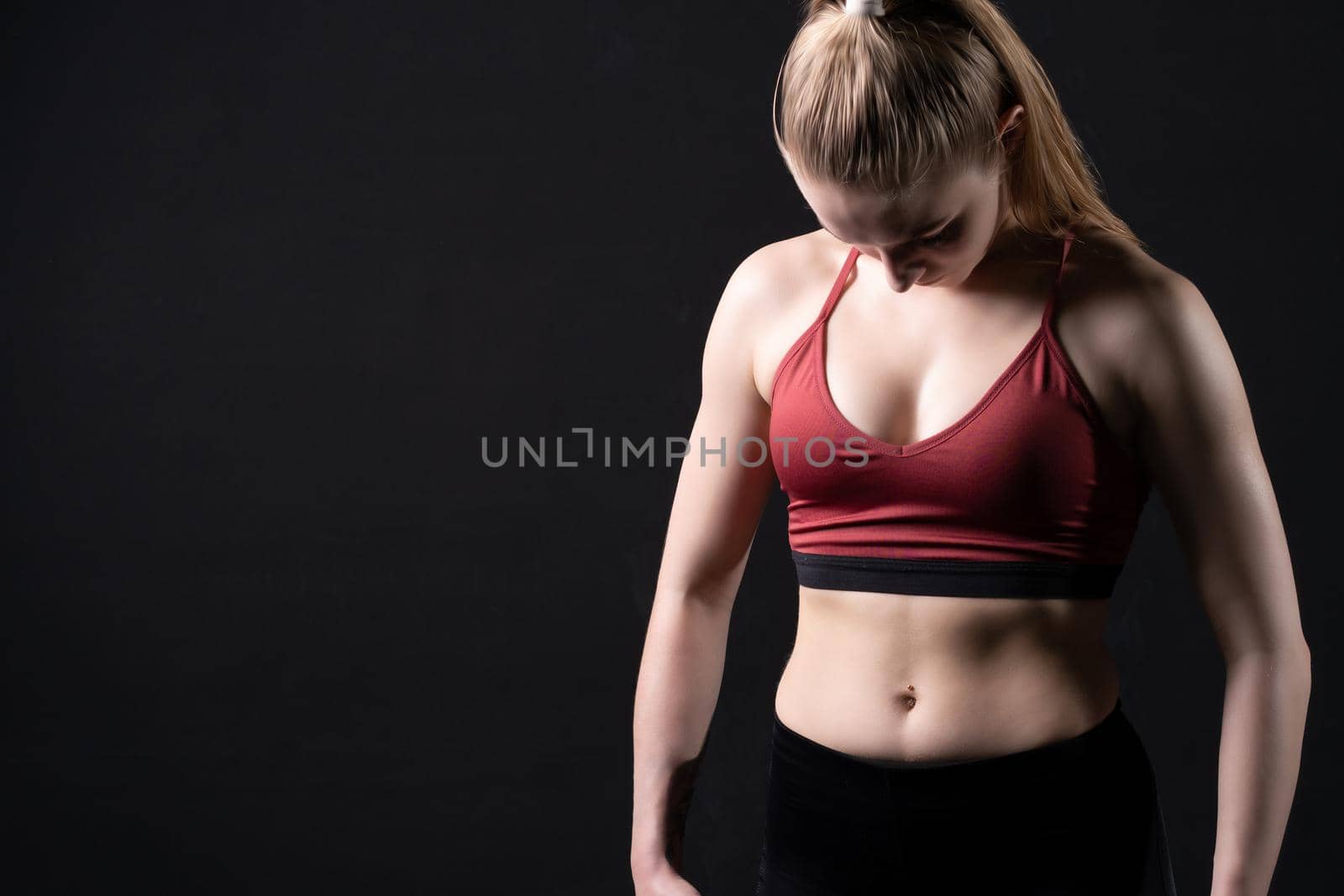 A the looks girl in uniform down girl sports dumbbells pres sports body, In the afternoon health fit in sport from training athlete, strong biceps. Sweat weight aerobics, perfect empty space