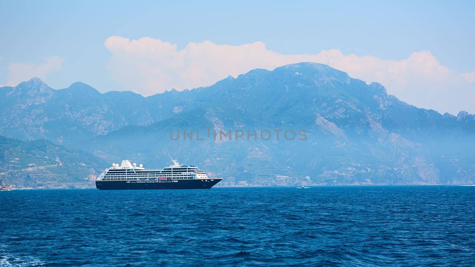 Cruise Ship came to Amalfi in Southern Italy. Aerial view.