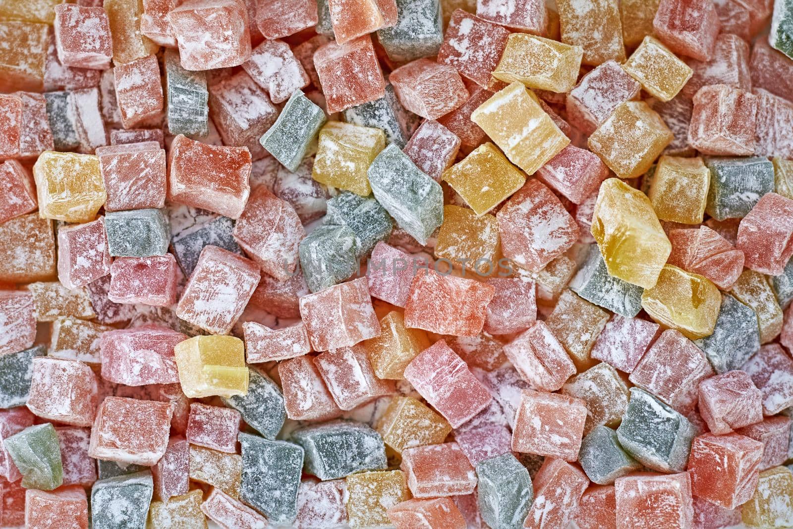 Many candies for background. Colored sweets texture, close up