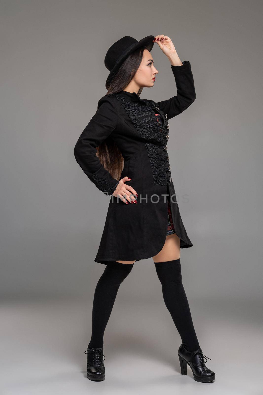 Full length portrait of a professional model posing at studio. by nazarovsergey