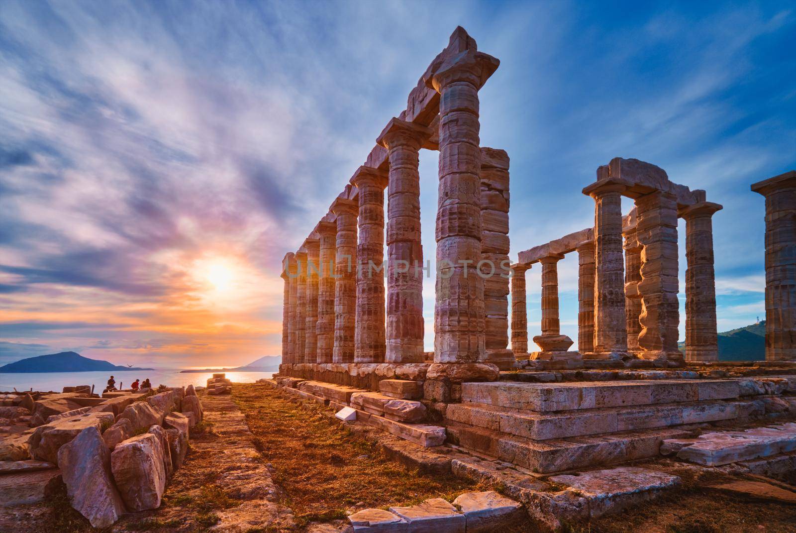 Poseidon temple ruins on Cape Sounio on sunset, Greece by dimol