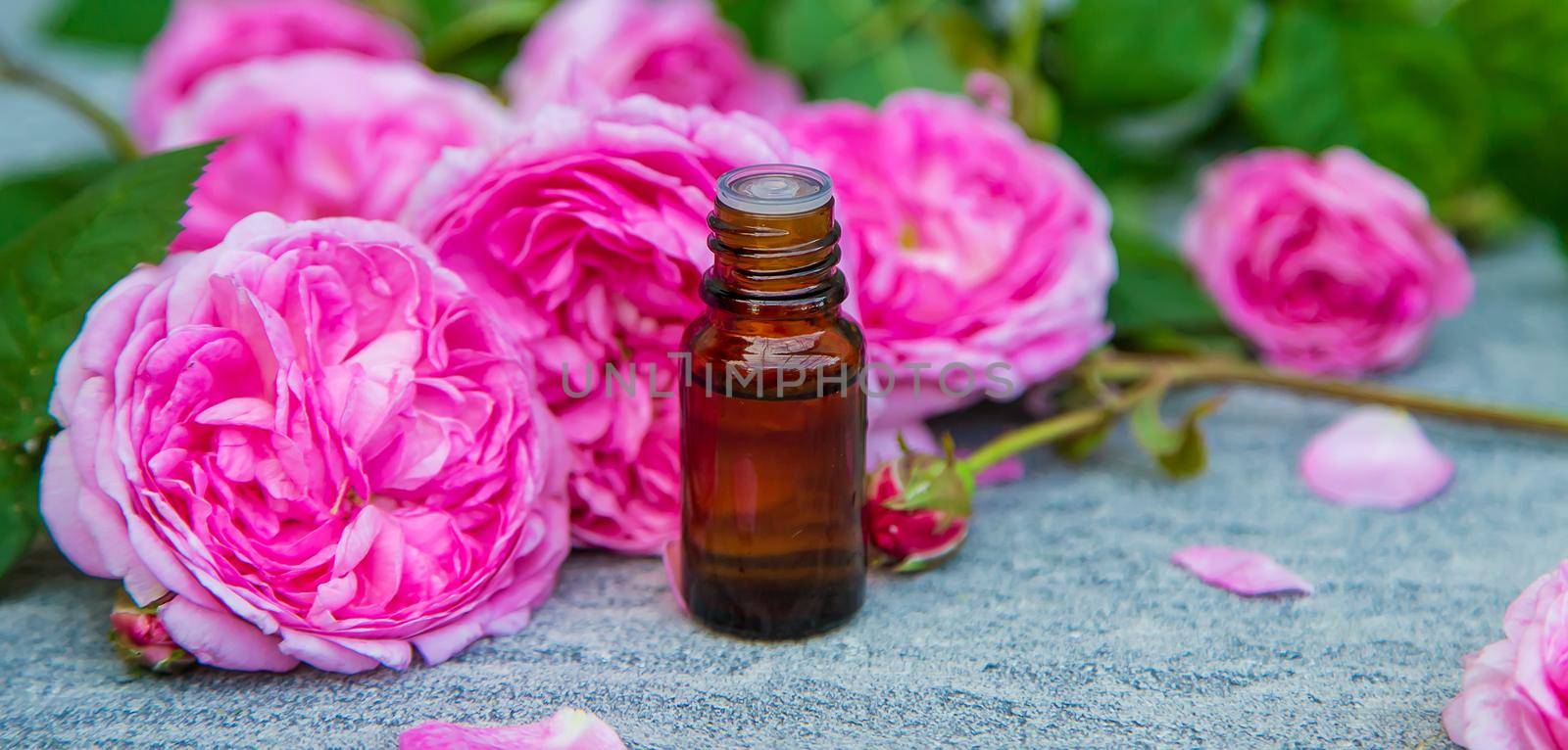 Essential oil extract of tea rose. Selective focus. nature.