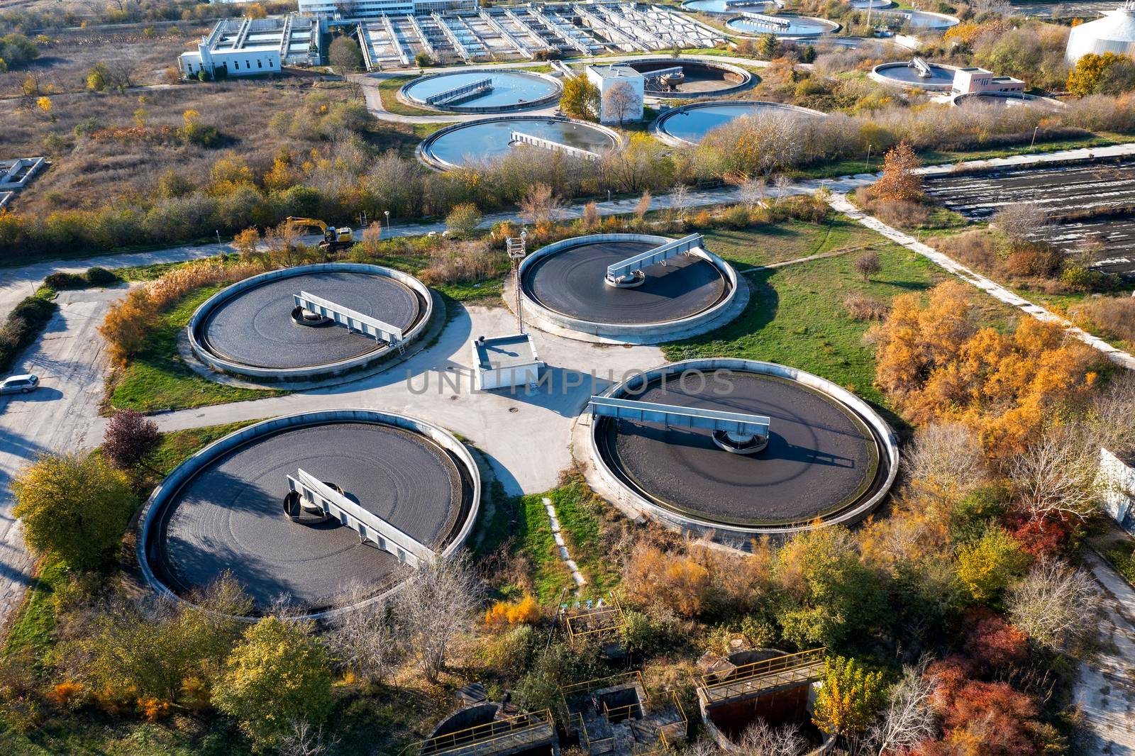 Aerial top view of a city sewage treatment plant. A group from the big sedimentation drainage. by EdVal