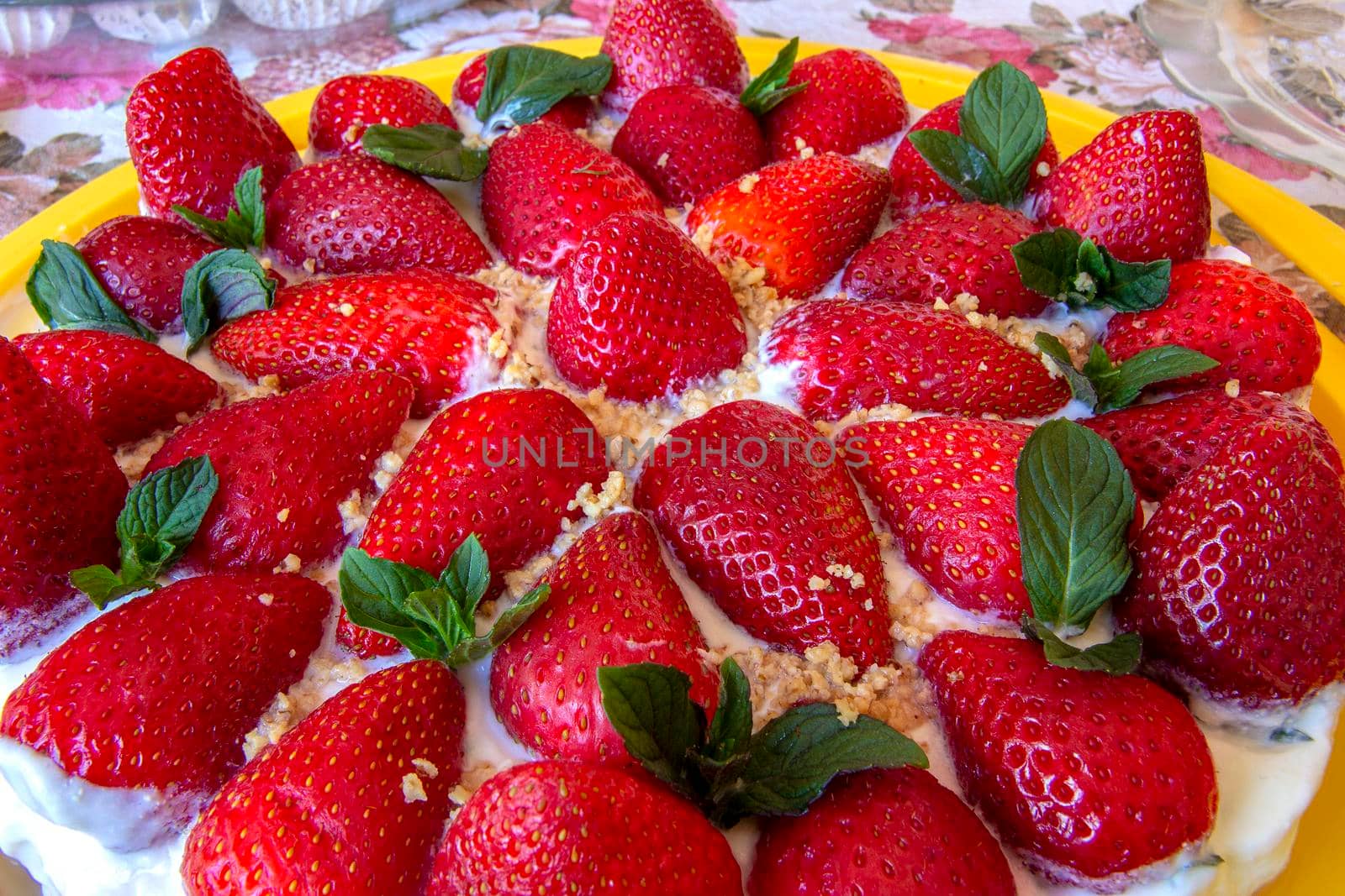Delicious cake covered with fresh strawberry, close-up view. by EdVal