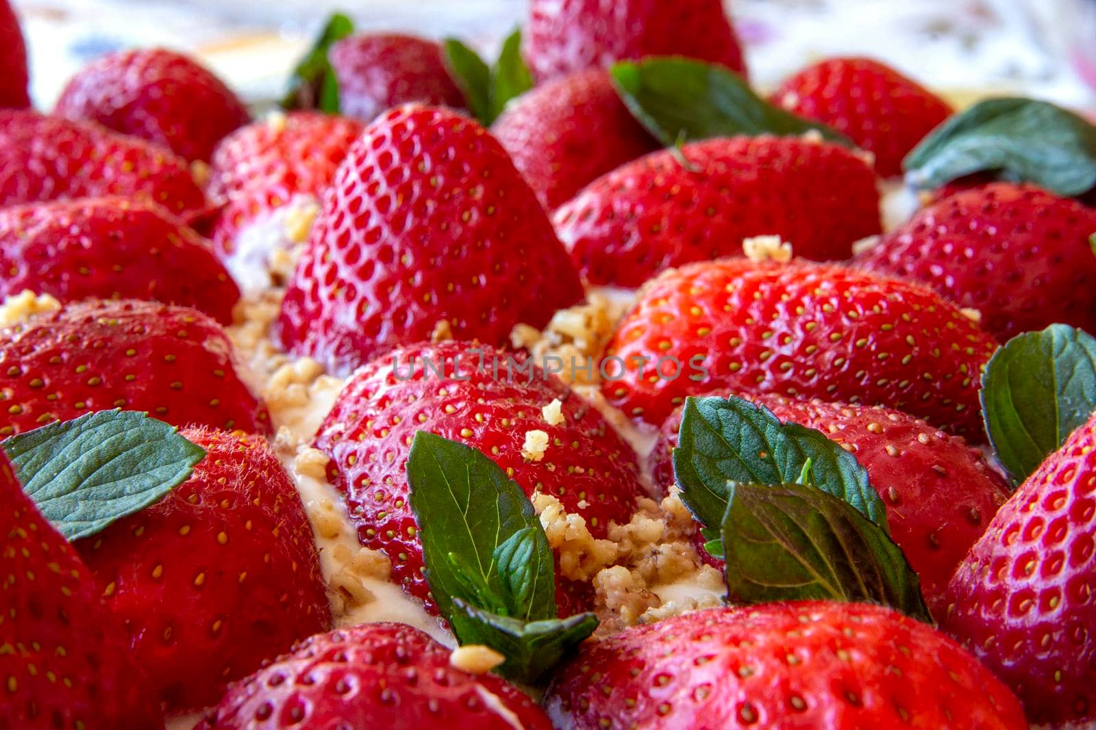Concept of tasty food with strawberry tart, close-up view.