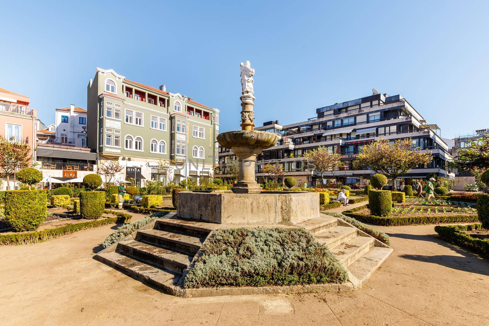 Braga, Portugal - October 27, 2021: Garden of Santa Barbara (Jardim de Santa Barbara) where gardeners work in the historic city center on an autumn day