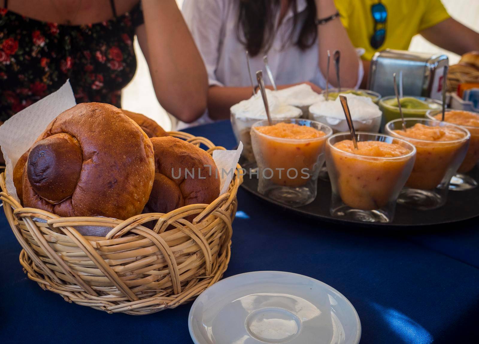 Sicilian granita, slush, with traditional pastry in basket by artofphoto