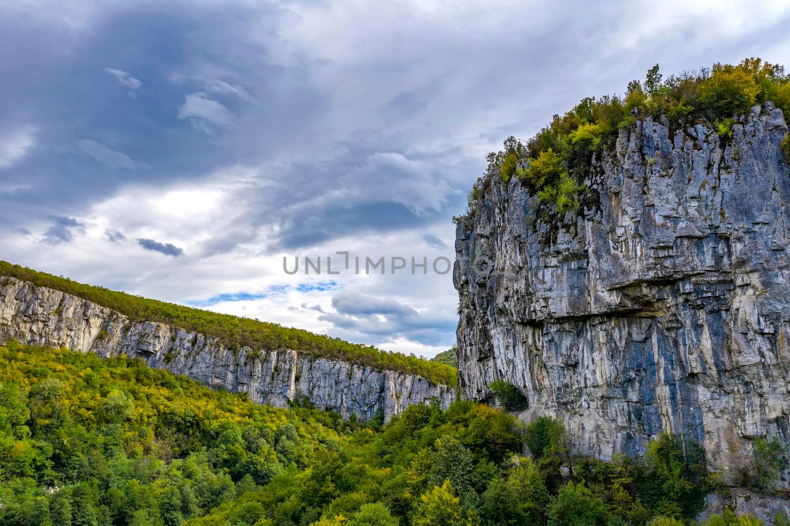 Mountain landscape. Scenic view of a mountain with big vertical rocks by EdVal