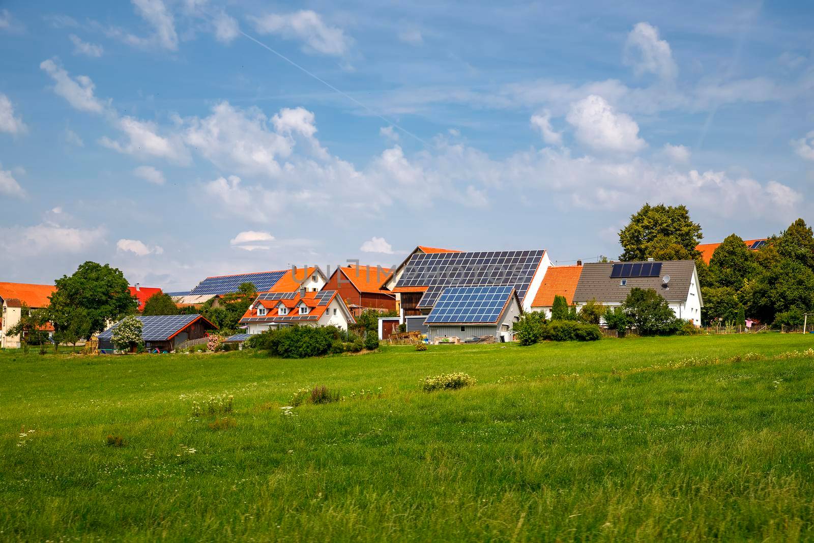 Solar panels on the roof of houses. Green energy 