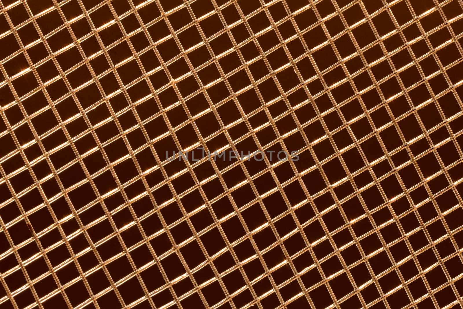 grid with a pattern of numerous small shaped cells on dark background, close view by EdVal
