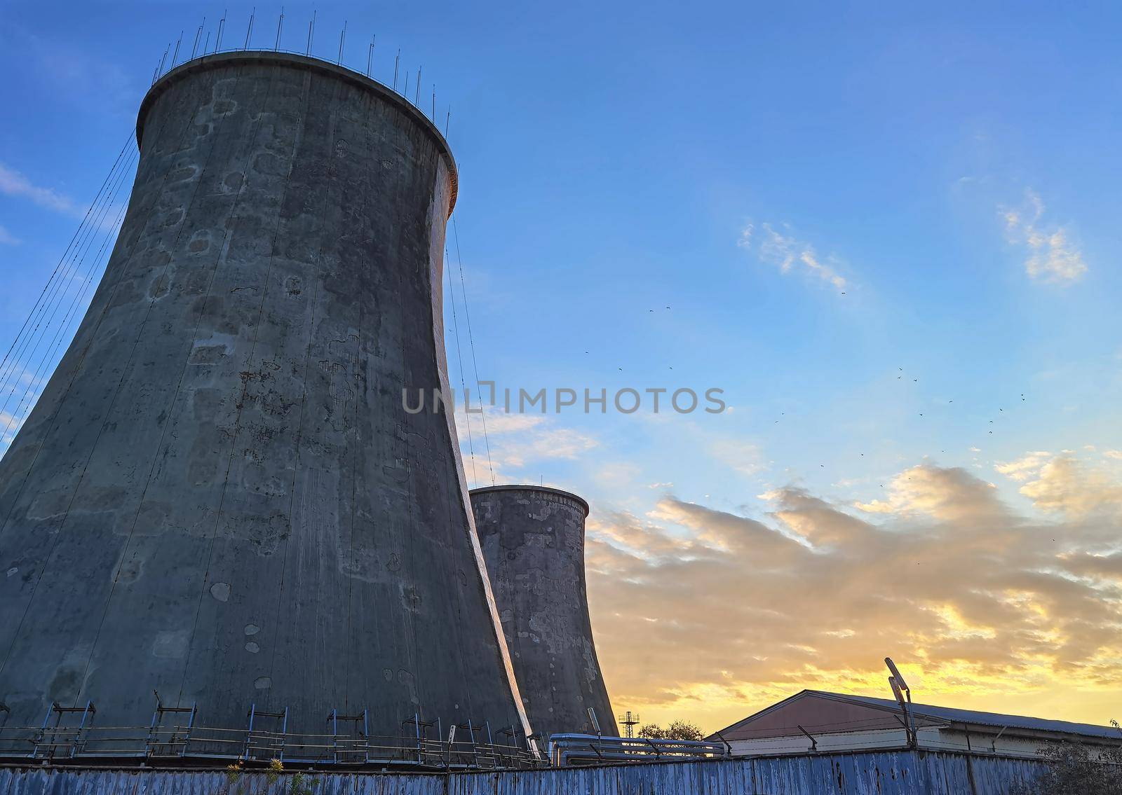 Industrial chimney made of concrete blocks. Concept of preserving the environment and taking care of nature