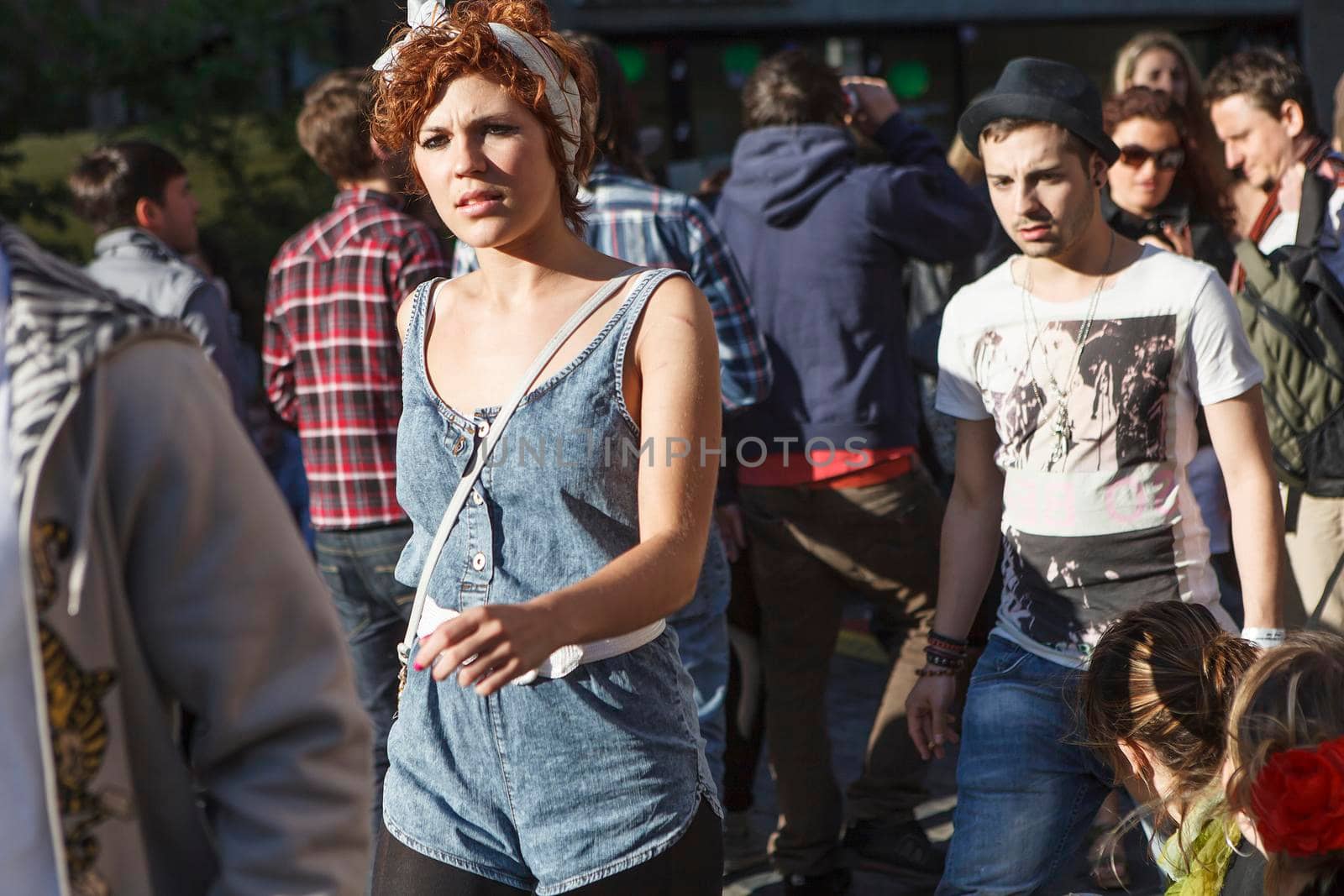 London, UK - September 2019, Busy time on Sunday at the brick lane market near cafe 1001. Fashionably dressed girls pass by the crowd by elenarostunova