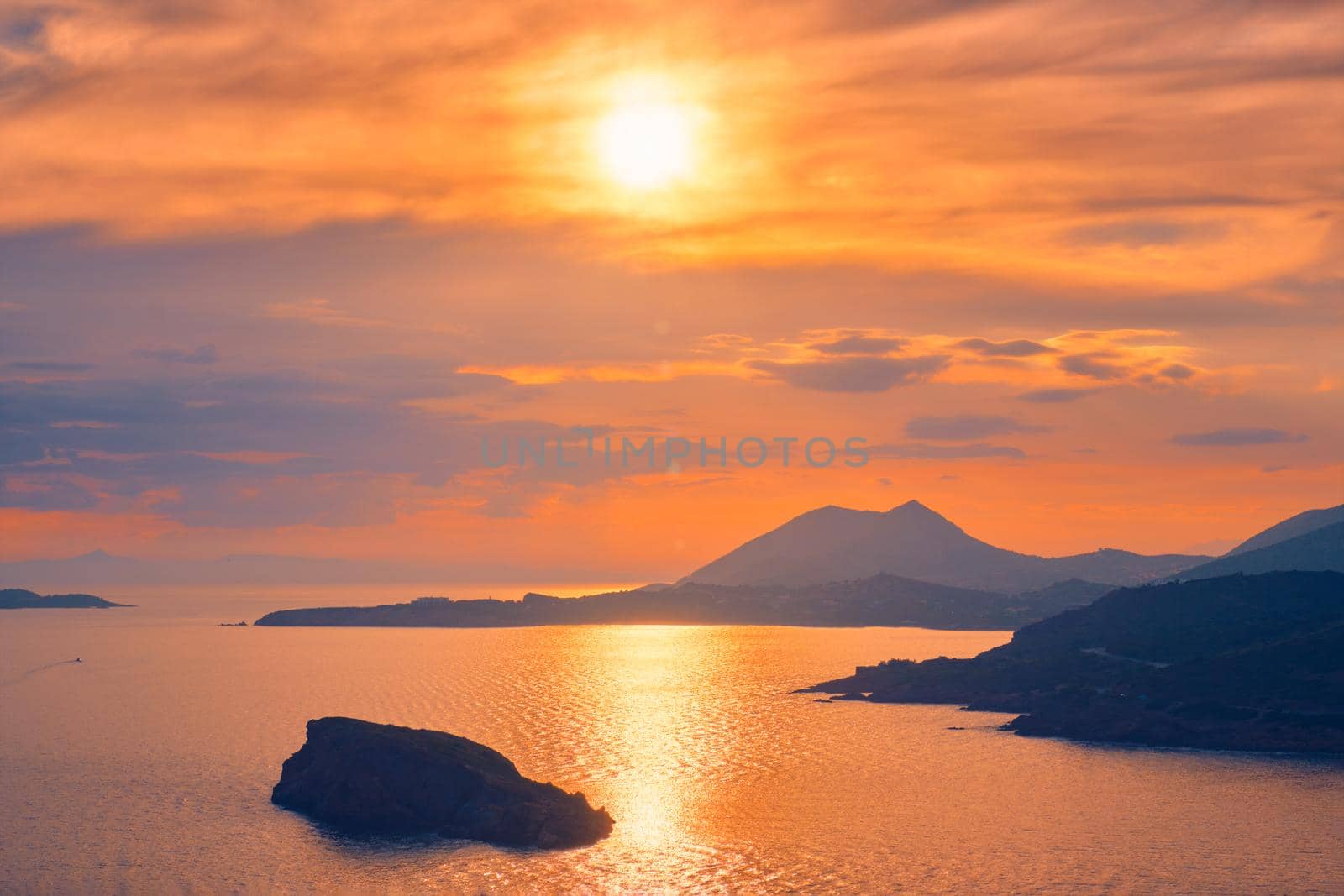 Aegean Sea with Greek islands view on sunset. Cape Sounion, Greece