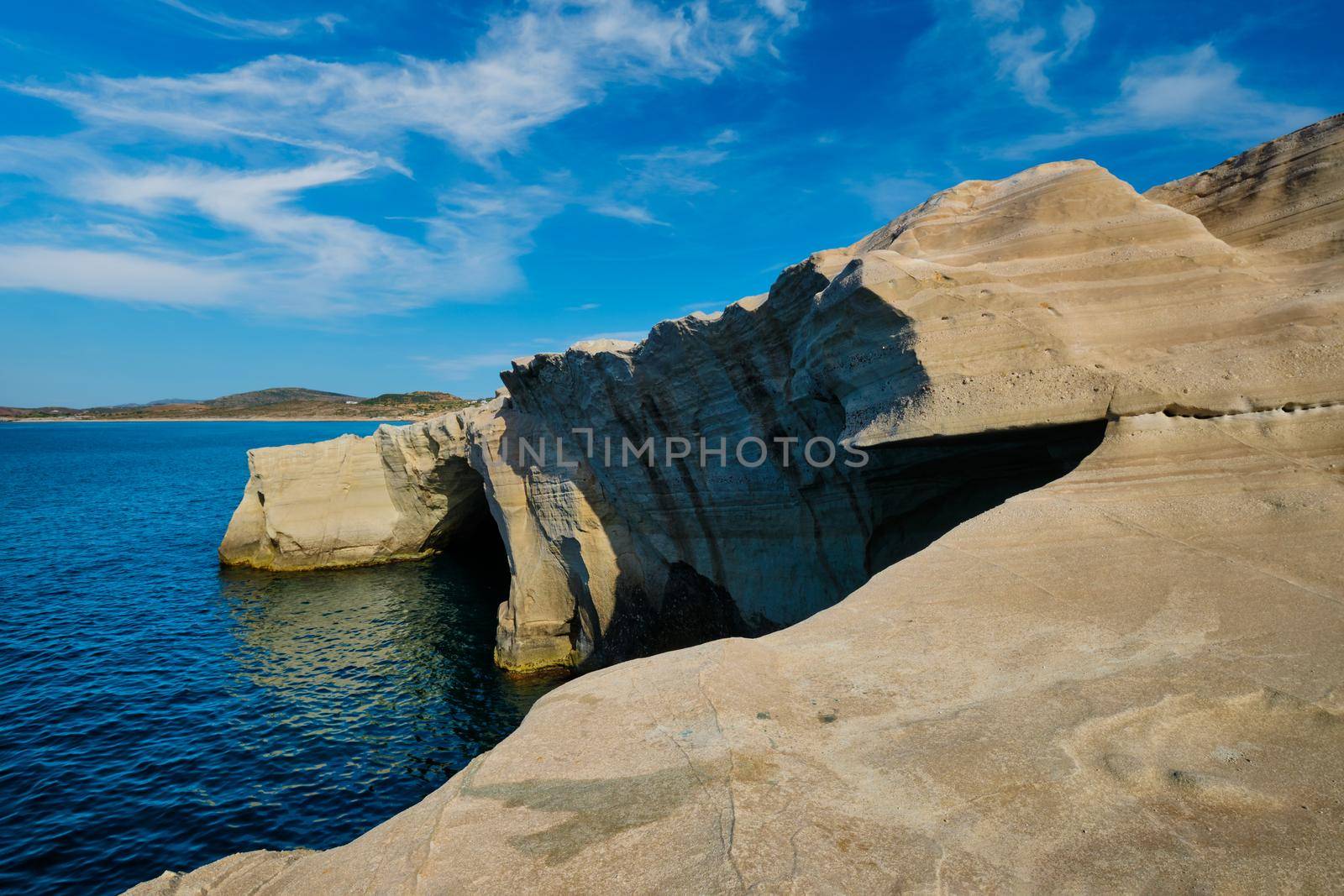 White rocks of famous tourist attraction of Milos island Sarakiniko beach and Aegean sea, Milos island , Reece