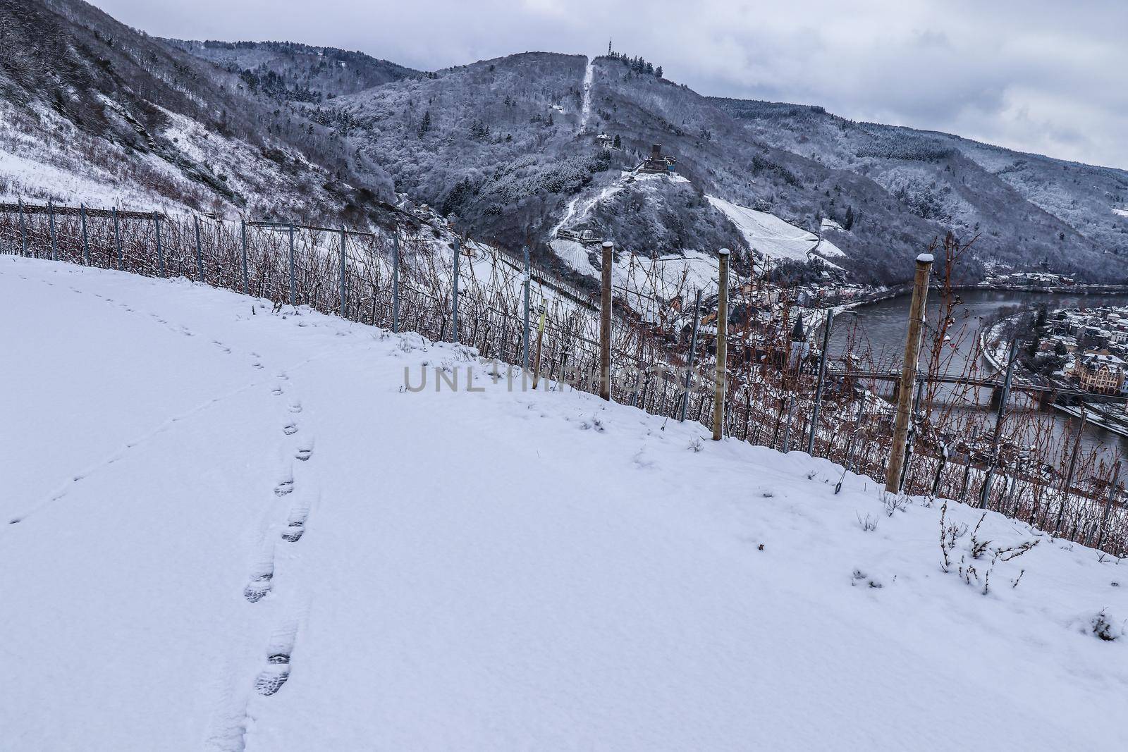Foot prints on the snow leading to the vineyard in Bernkastel-kues, Germany