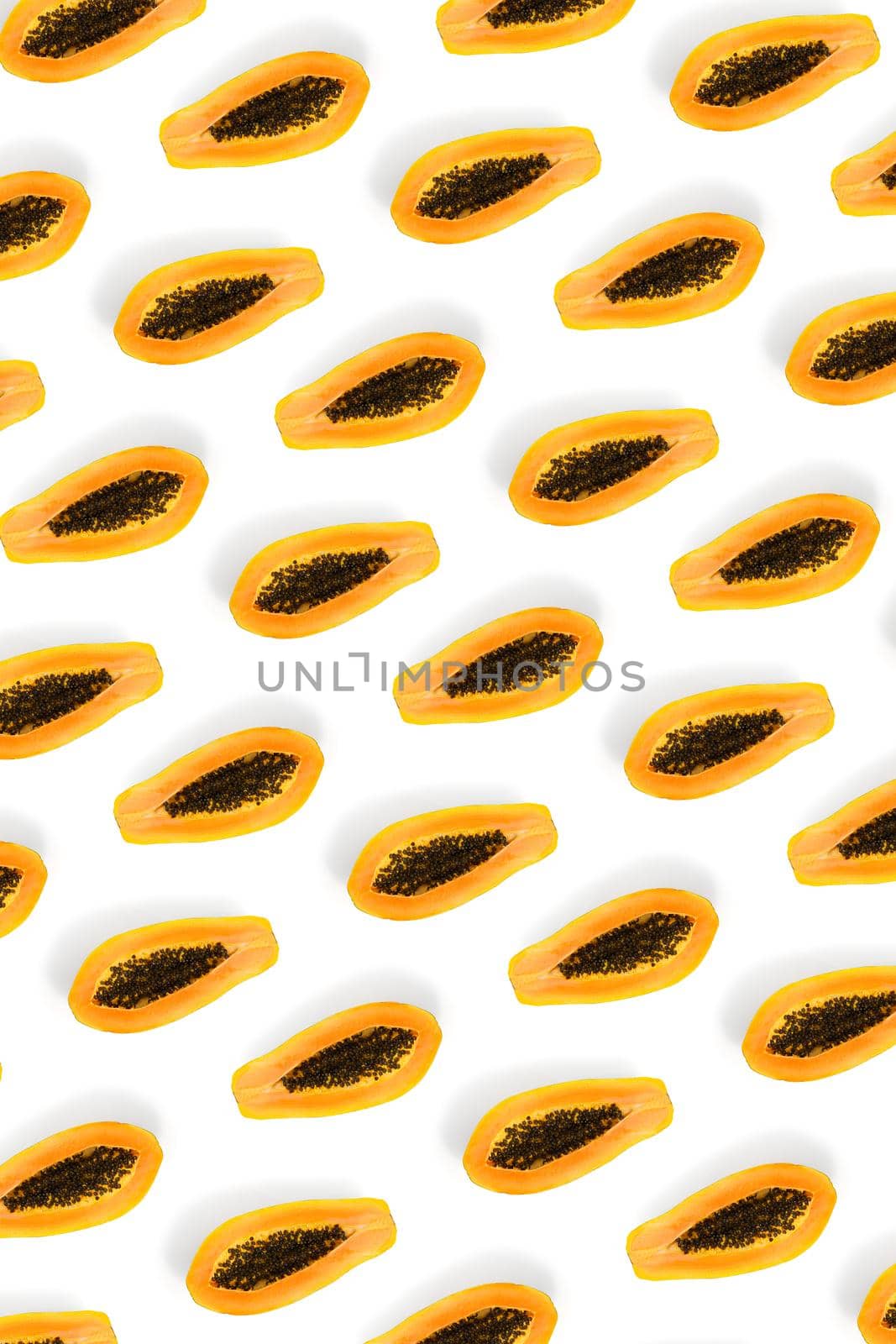Fresh ripe papaya background on white backdrop. Tropical abstract background. Top view. modern by PhotoTime