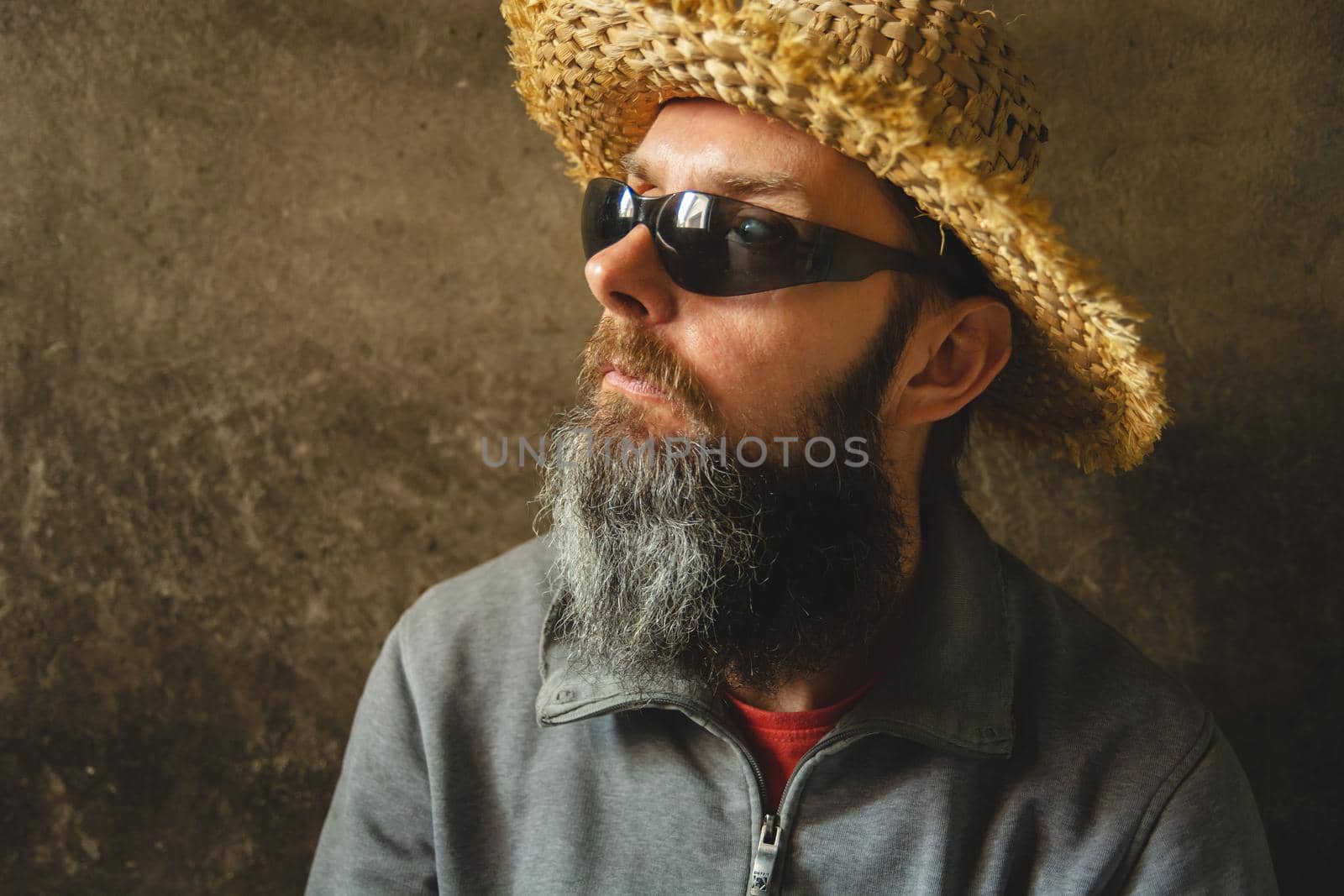 A man with a long beard in a straw hat by darekb22