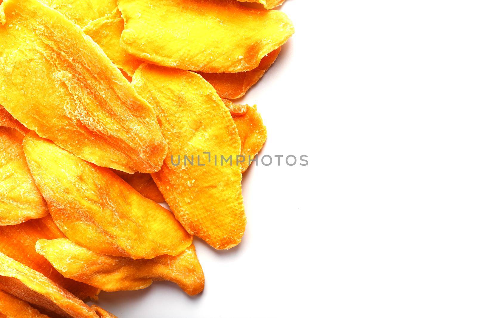 Orange Slices of Dried Sugar Mango Isolated on White Background