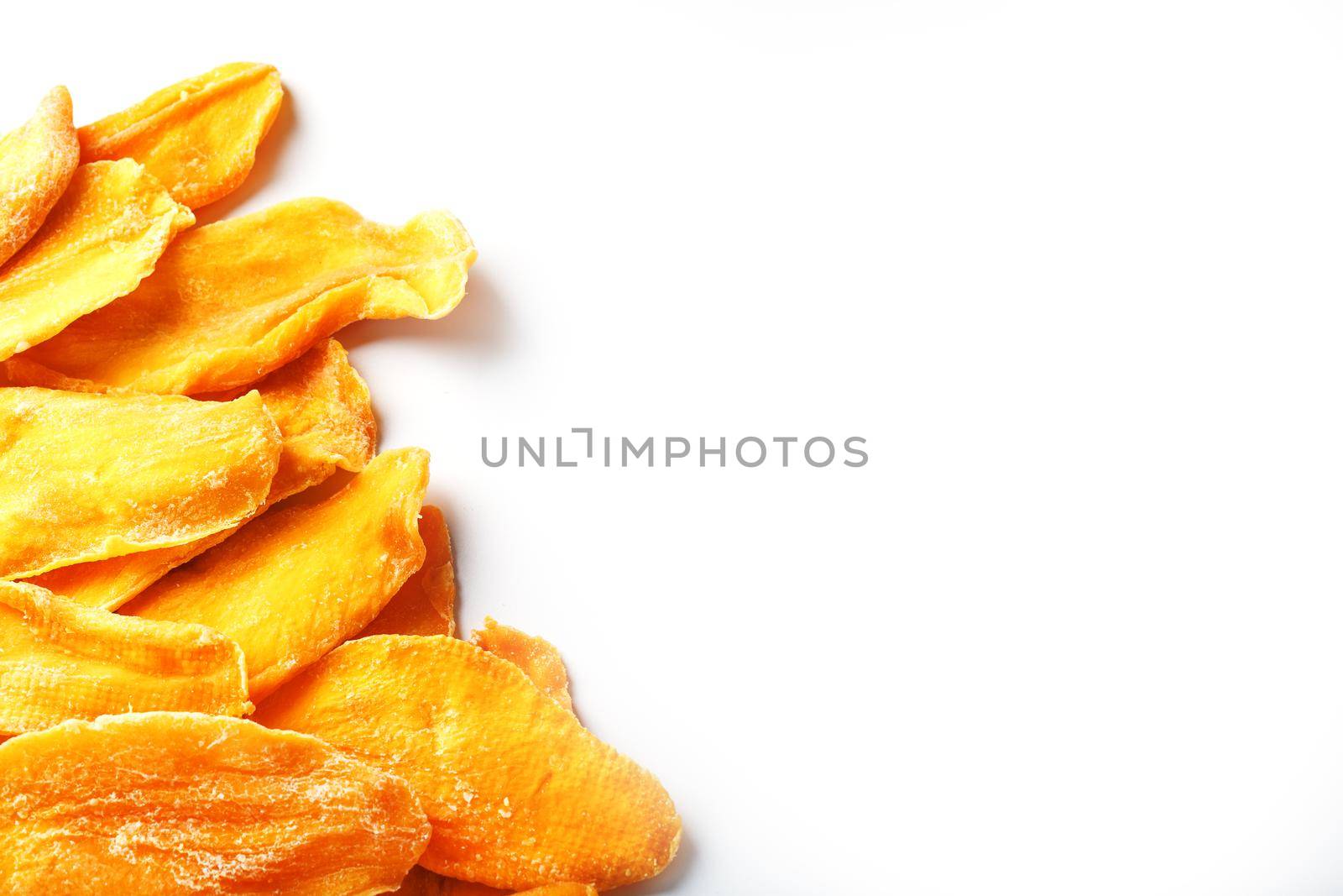 Orange Slices of Dried Sugar Mango Isolated on White Background