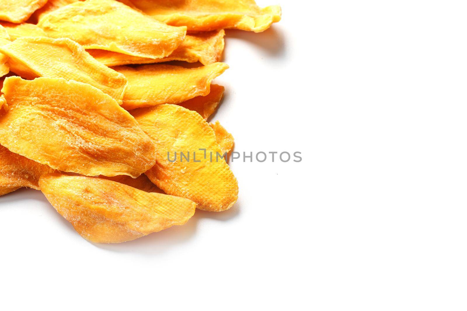 Orange Slices of Dried Sugar Mango Isolated on White Background