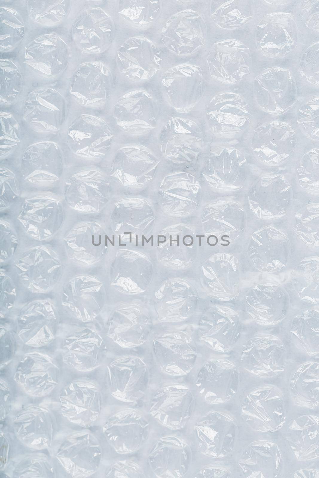 Packing bubble wrap for parcels on a White background in full screen