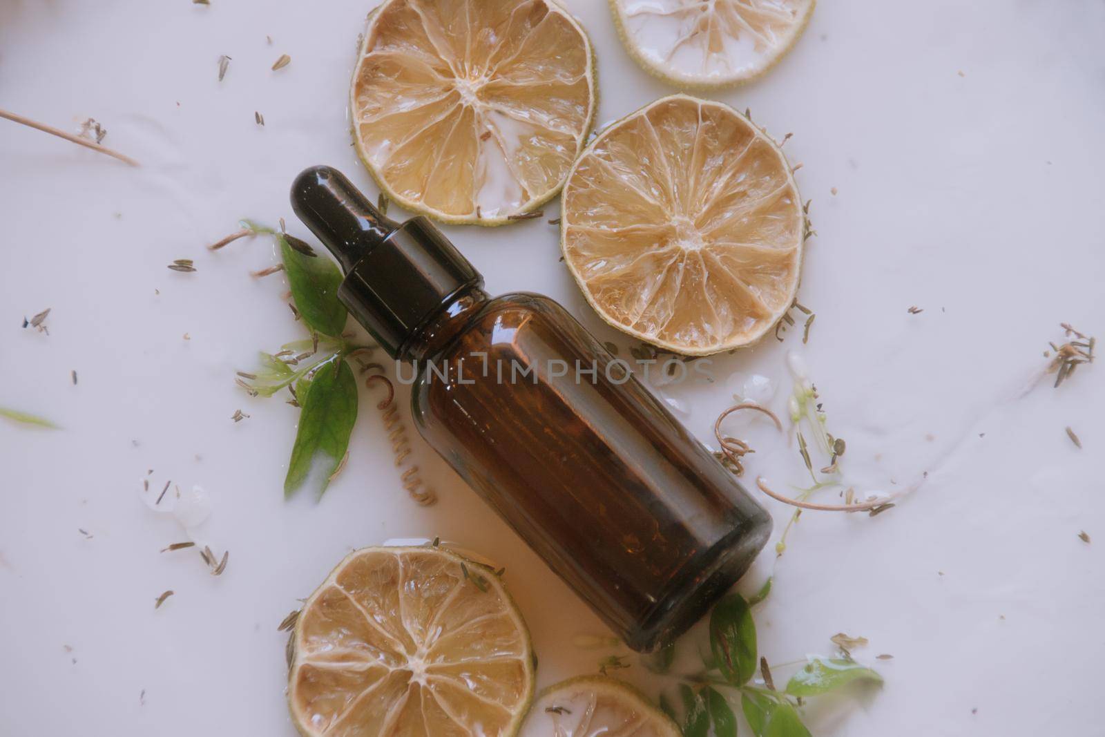 Product photo of a glass dropper bottle containing natural anti aging serum by Sonnet15