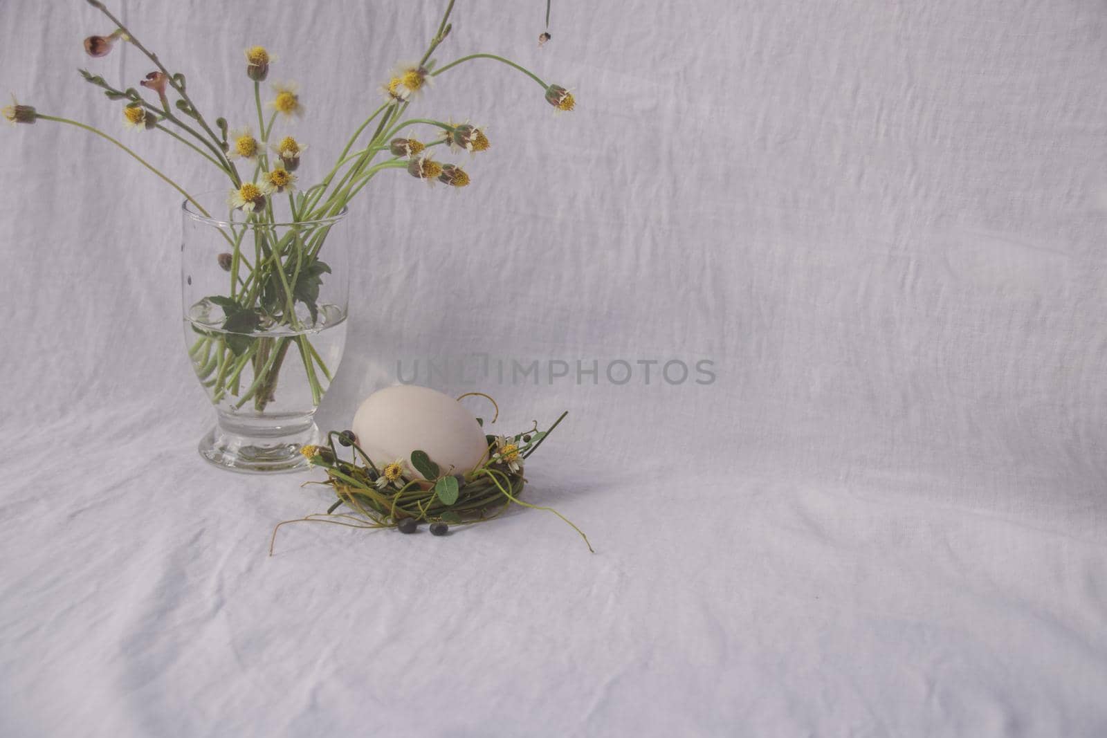 Easter Egg on a Nest of Flowers by Sonnet15