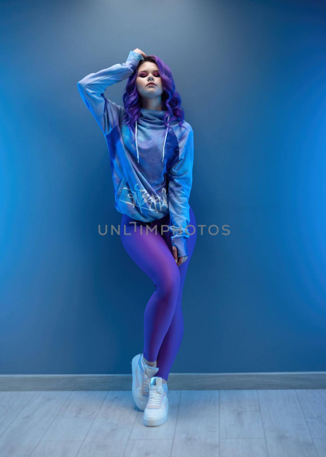 a girl in stylish purple sportswear and with purple hair poses sexually by Rotozey