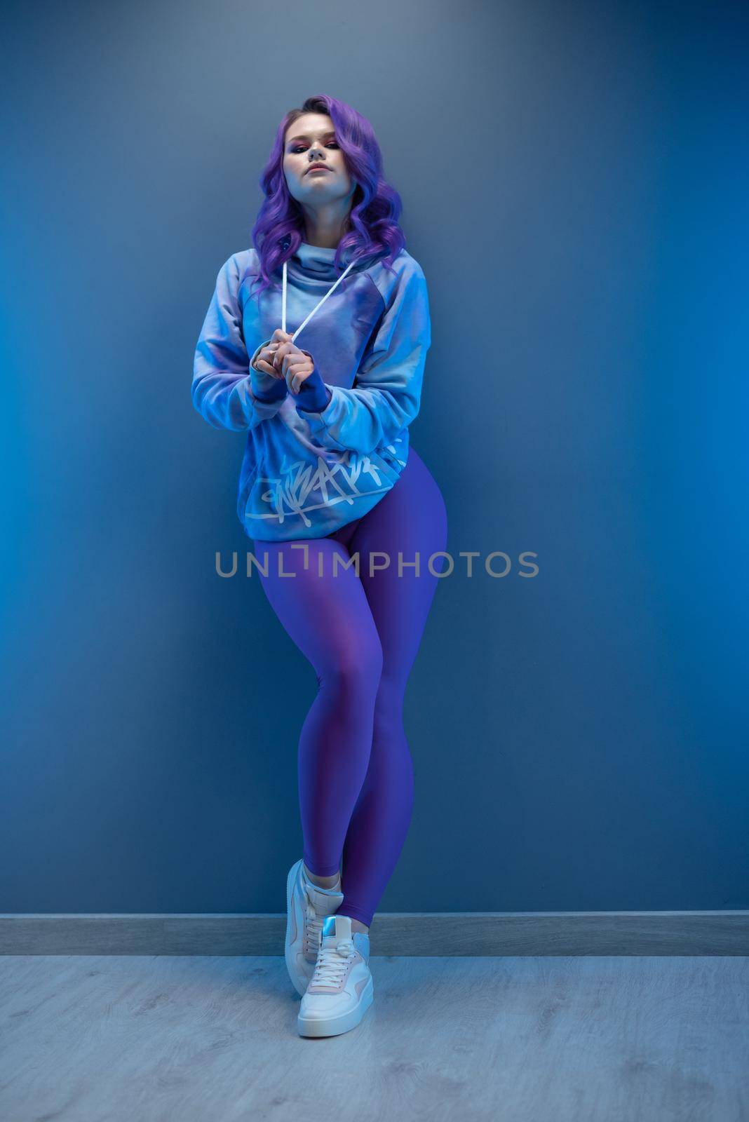 a girl in stylish purple sportswear and with purple hair poses sexually by Rotozey