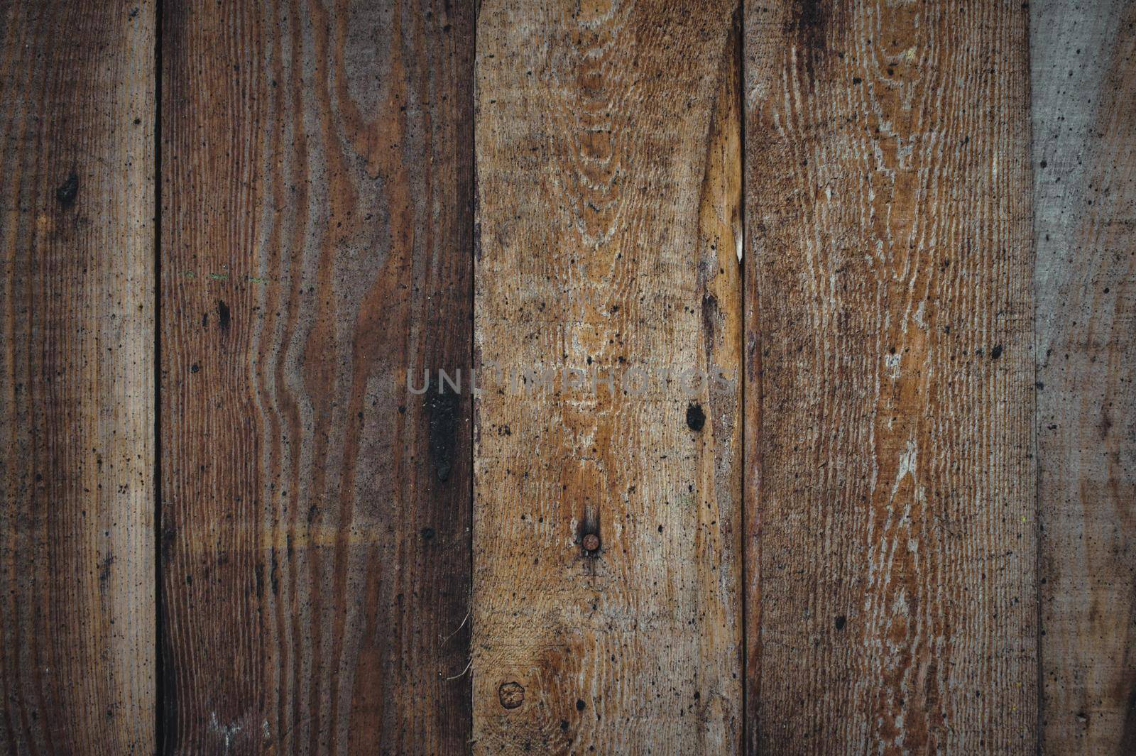 Vertical wooden planks forming a rough wood texture background