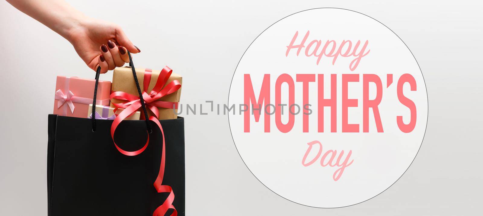 Top view aerial image of decoration Happy mothers day holiday background concept.Flat lay mom white card with gift box.