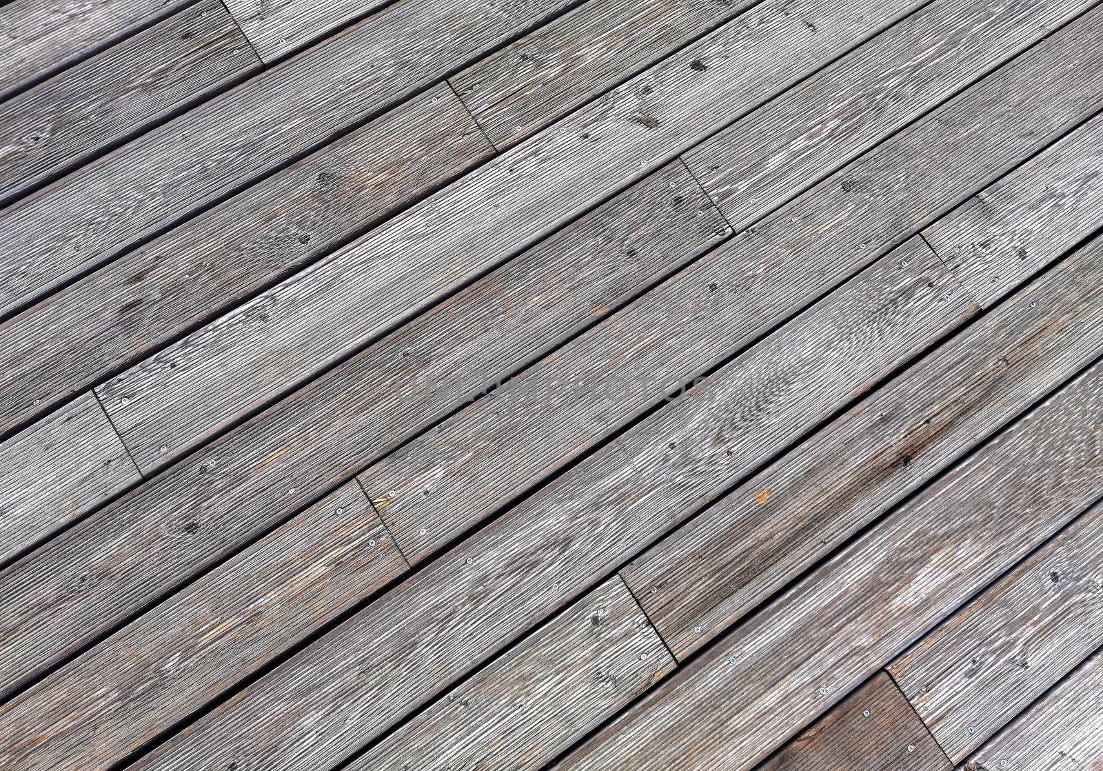 Natural grey surface from wood boards. Decking tiles. Horizontal view by EdVal