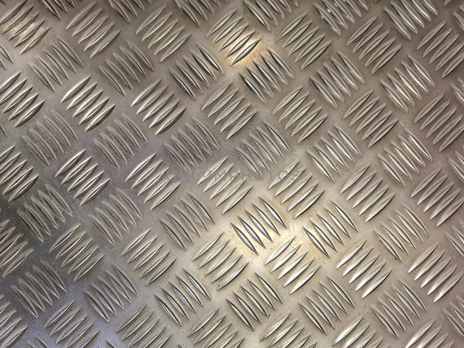 shiny metal texture with diamond pattern. stainless steel background. Industrial metal texture.  by EdVal