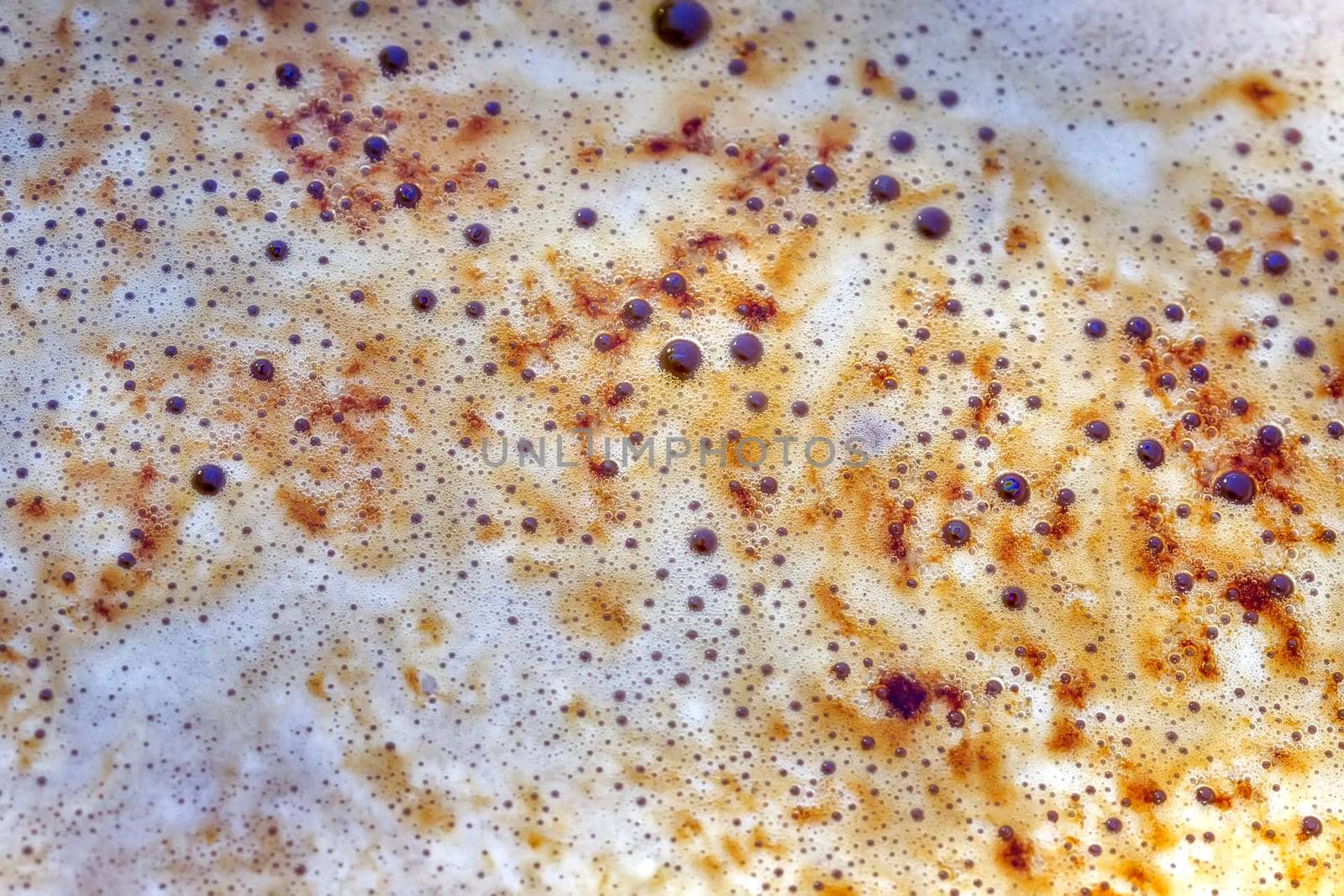 The surface of coffee foam. Macro. Abstract, Detail texture, close up background.