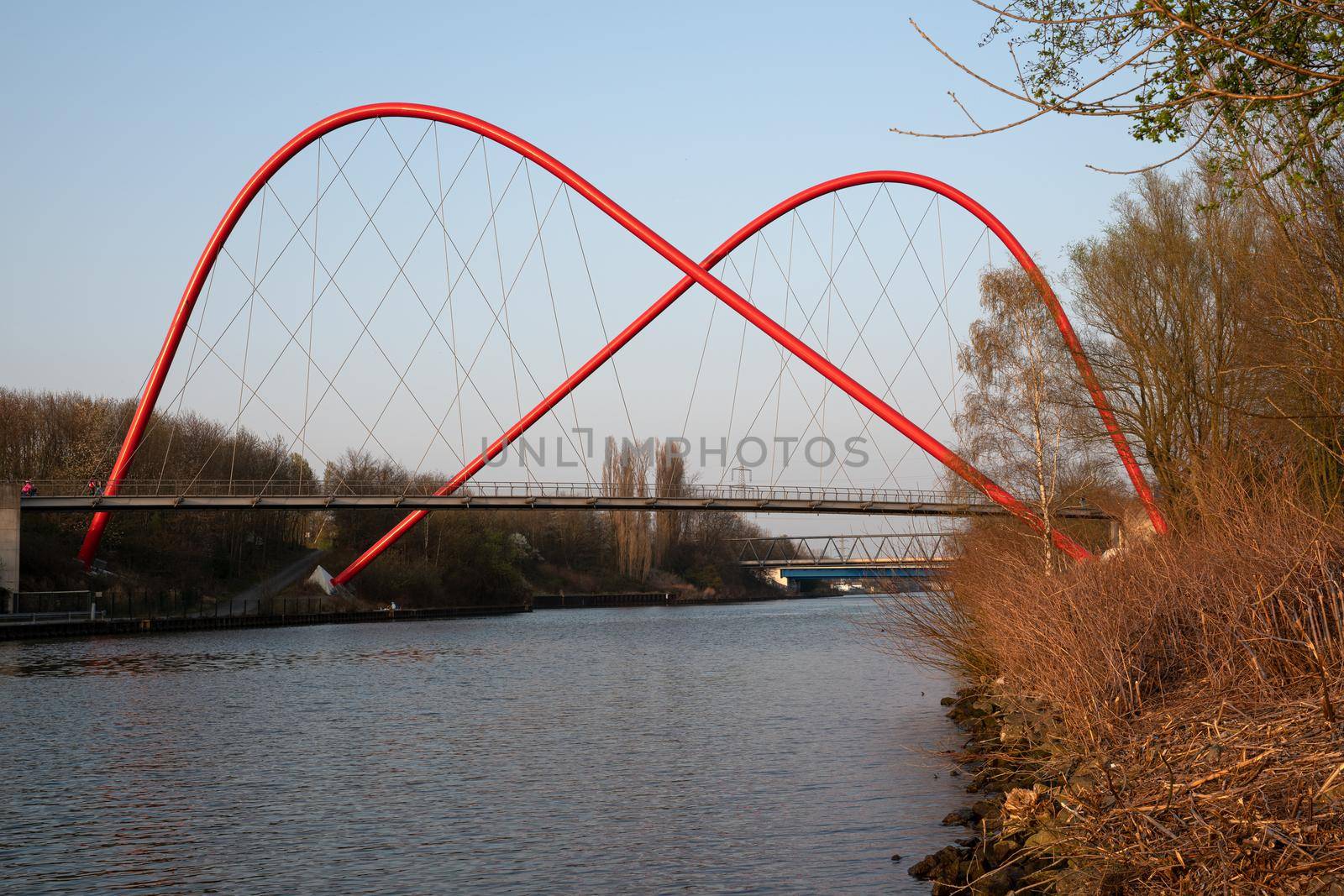 Bridge crossing the Rhine-Herne-Channel during sunset, Nordsternpark, Gelsenkirchen, Germany