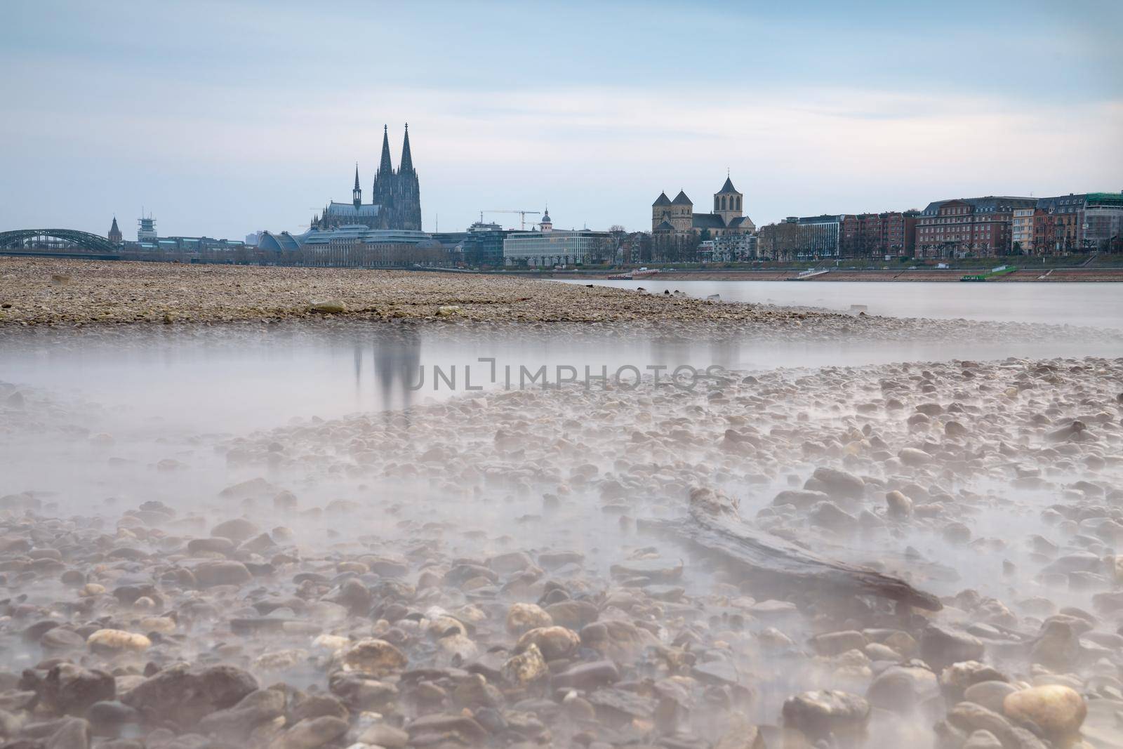 Low water of the Rhine river in Cologne, drought in Germany