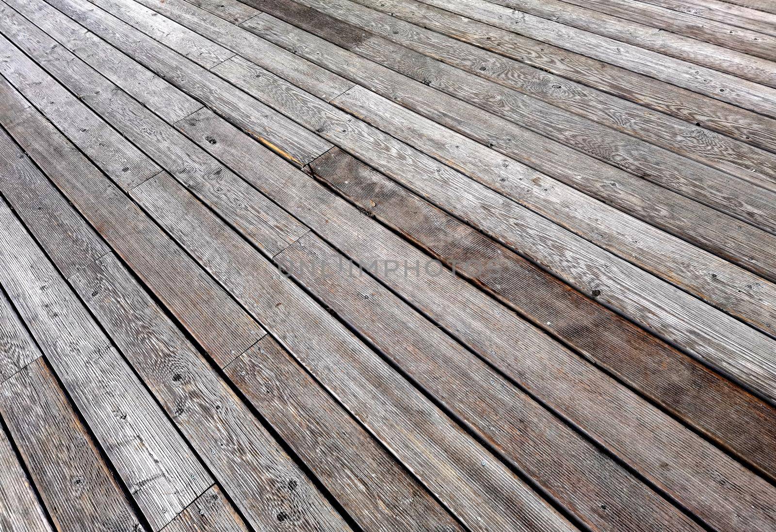 Natural grey surface from wood boards. Decking tiles. Horizontal view by EdVal