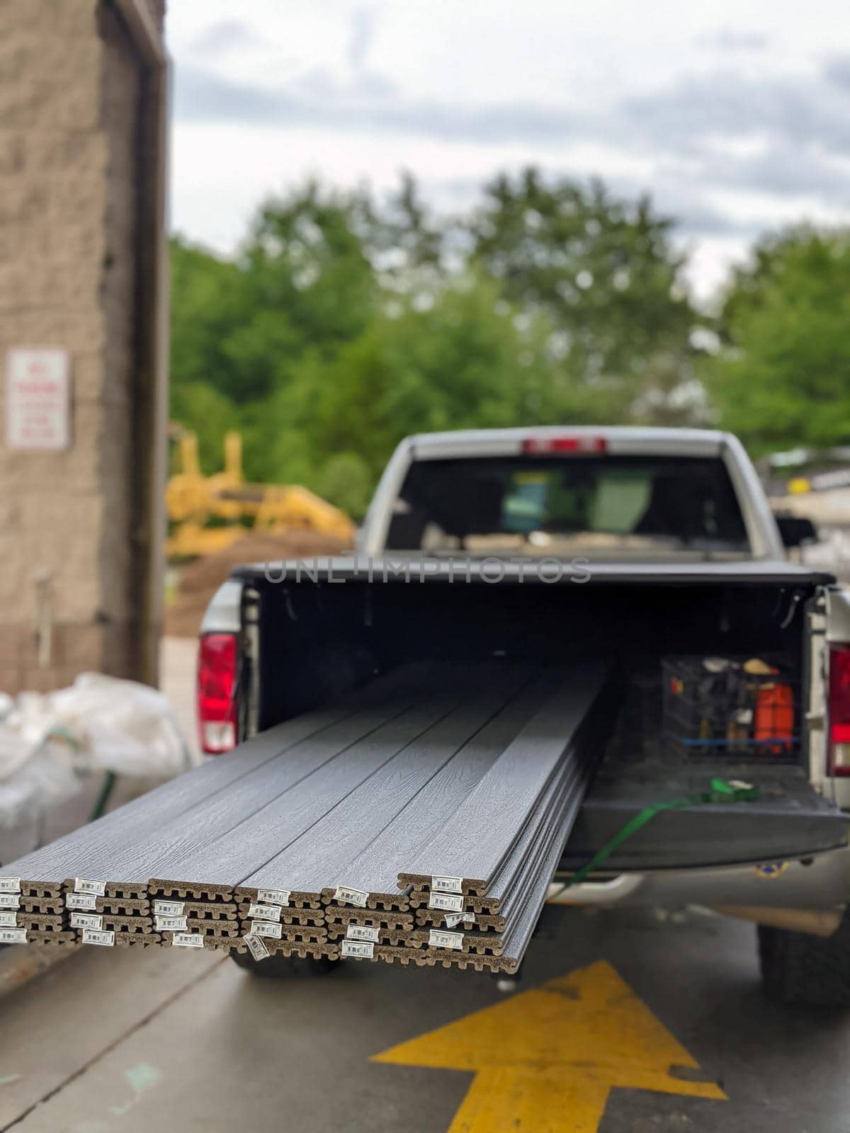 pickup truck loaded with coposide decking