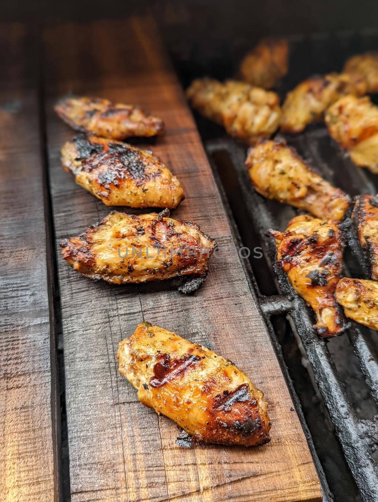 Chicken meat fried on a barbecue grill by digidreamgrafix