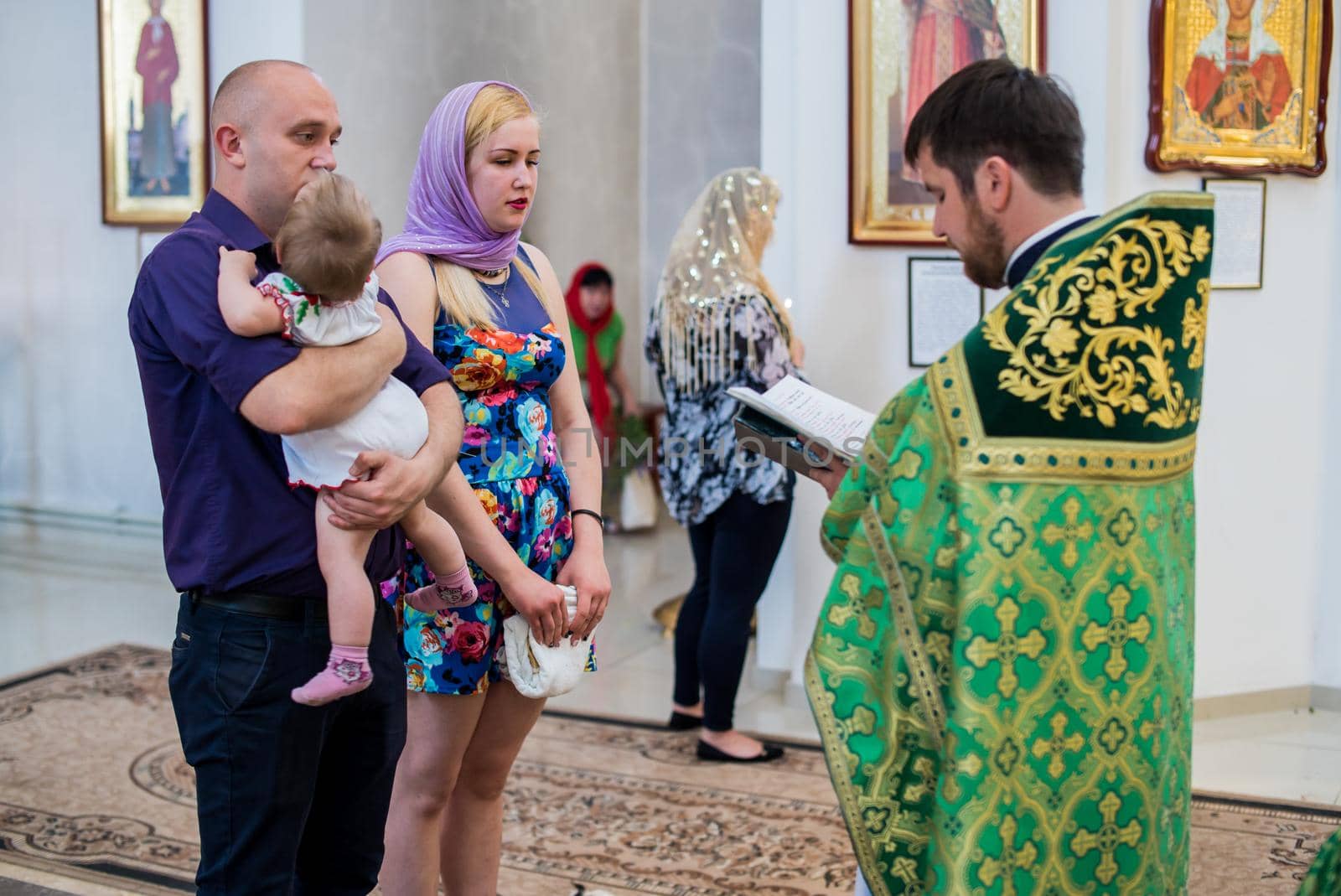 Krivoy Rog, Ulraine - 06.06.2019 The sacrament of baptism. Newborn baby during christening and chrismation by mosfet_ua