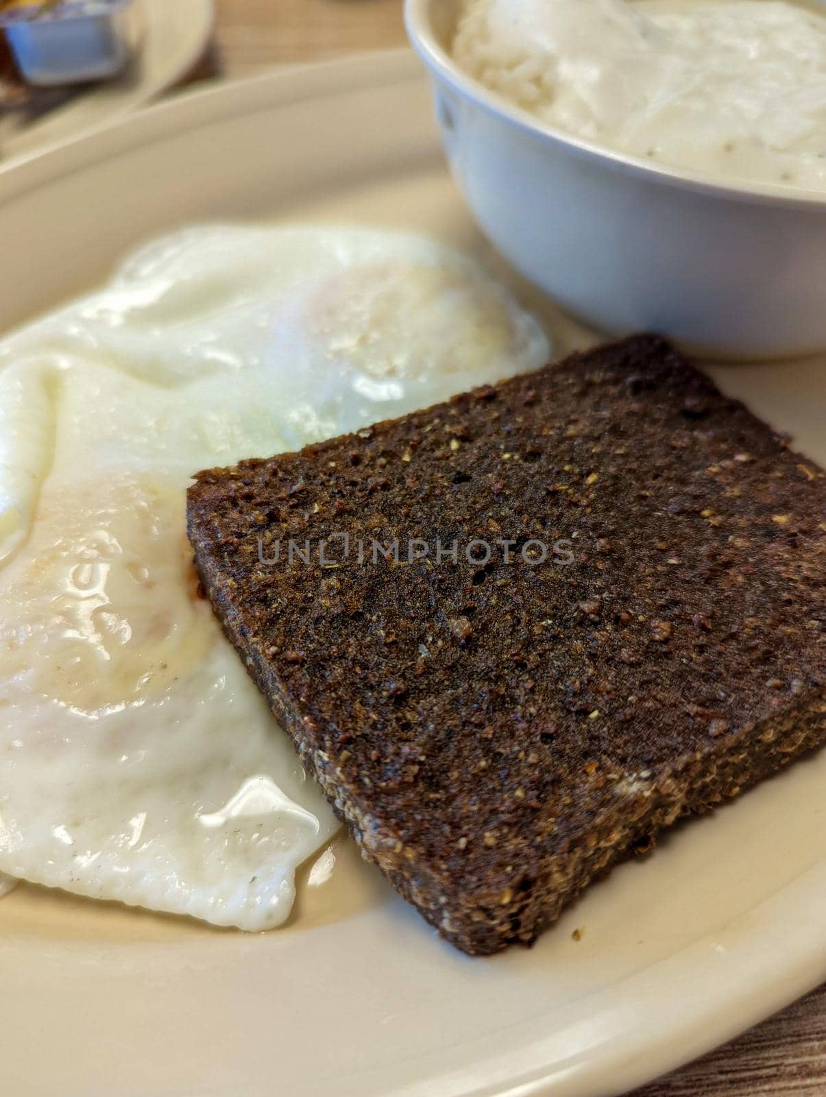 morning livermush breakfast with eggs and gravy by digidreamgrafix