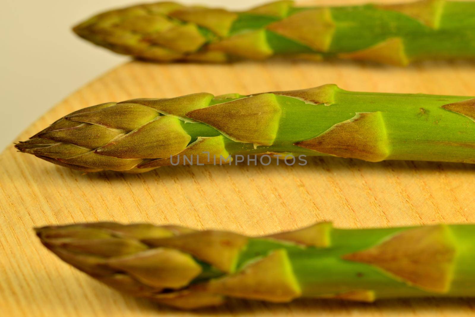 fresh green asparagus in a closeup by Jochen