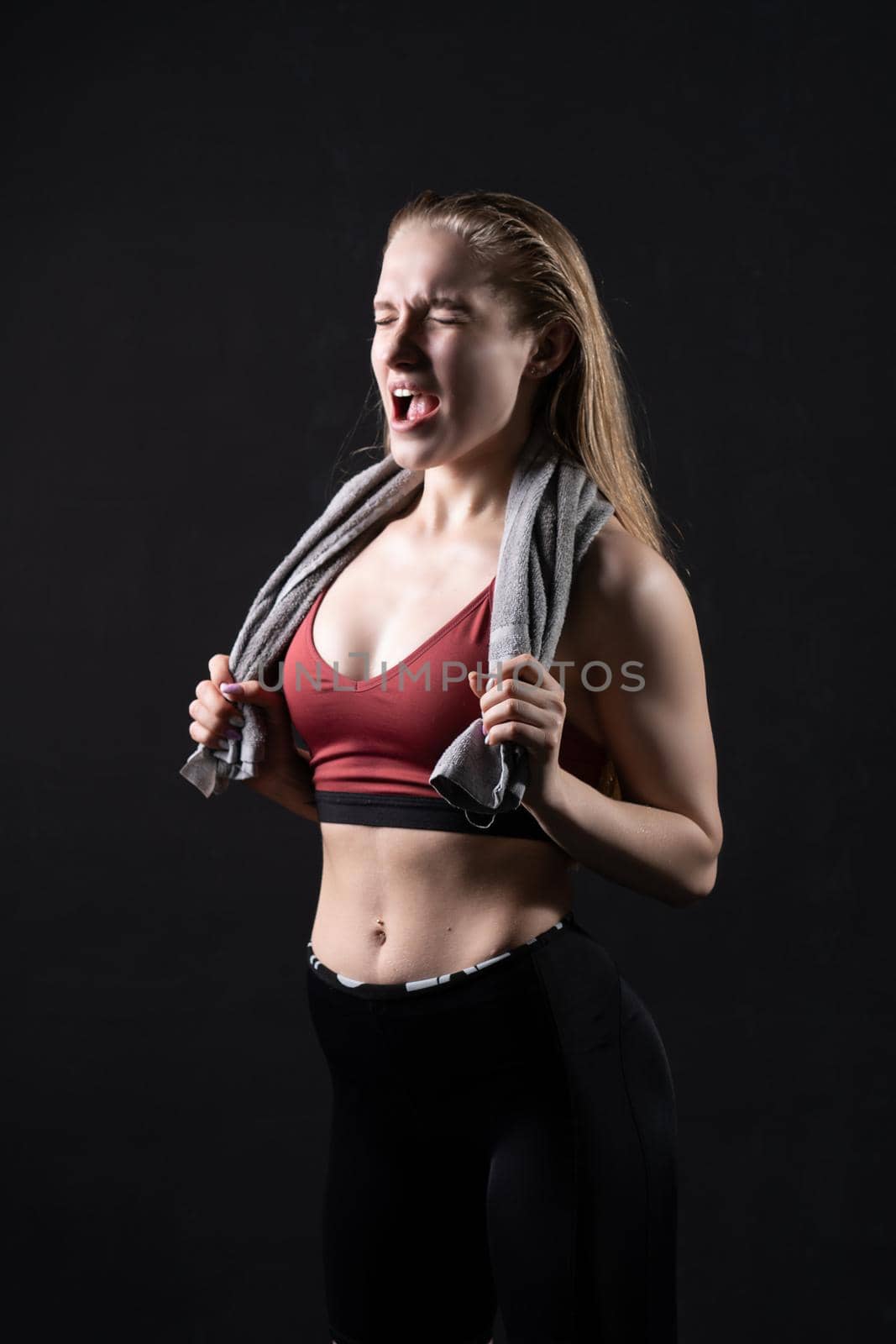 Girl grey a towel black background on on like shoulders knightly kira girl dumbbells sports body, In the afternoon gym lifestyle from sport for training strength, sexy biceps. Sweat ABS aerobics