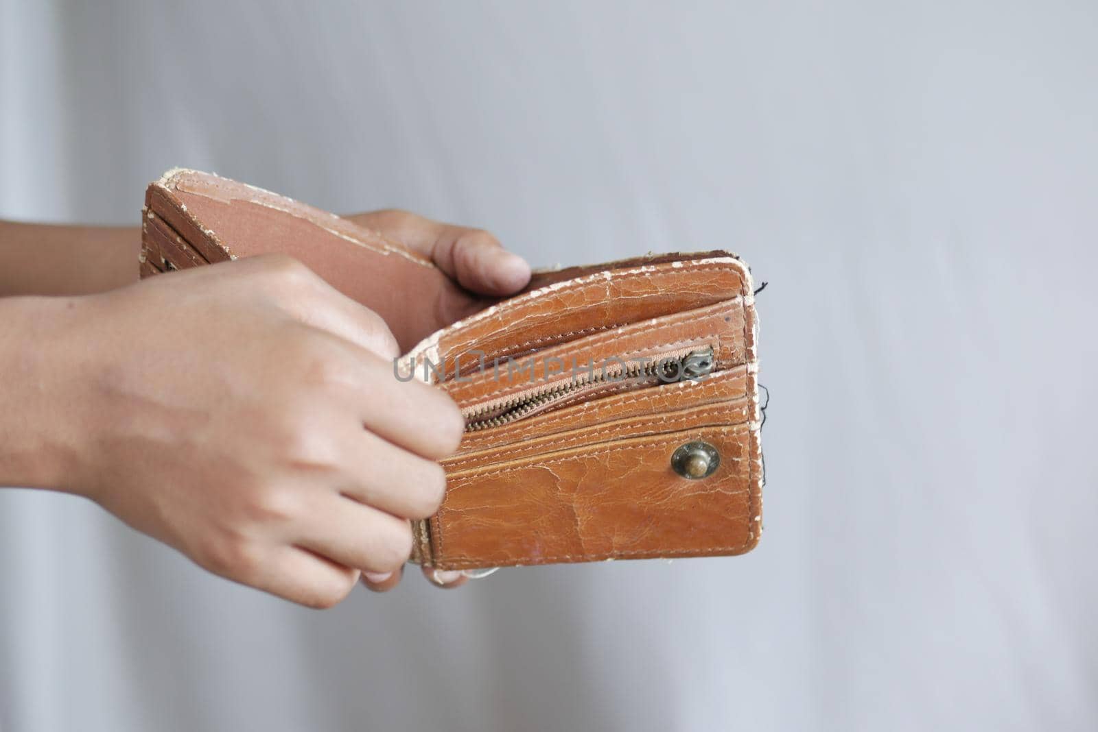 Man hand open an empty wallet with copy space