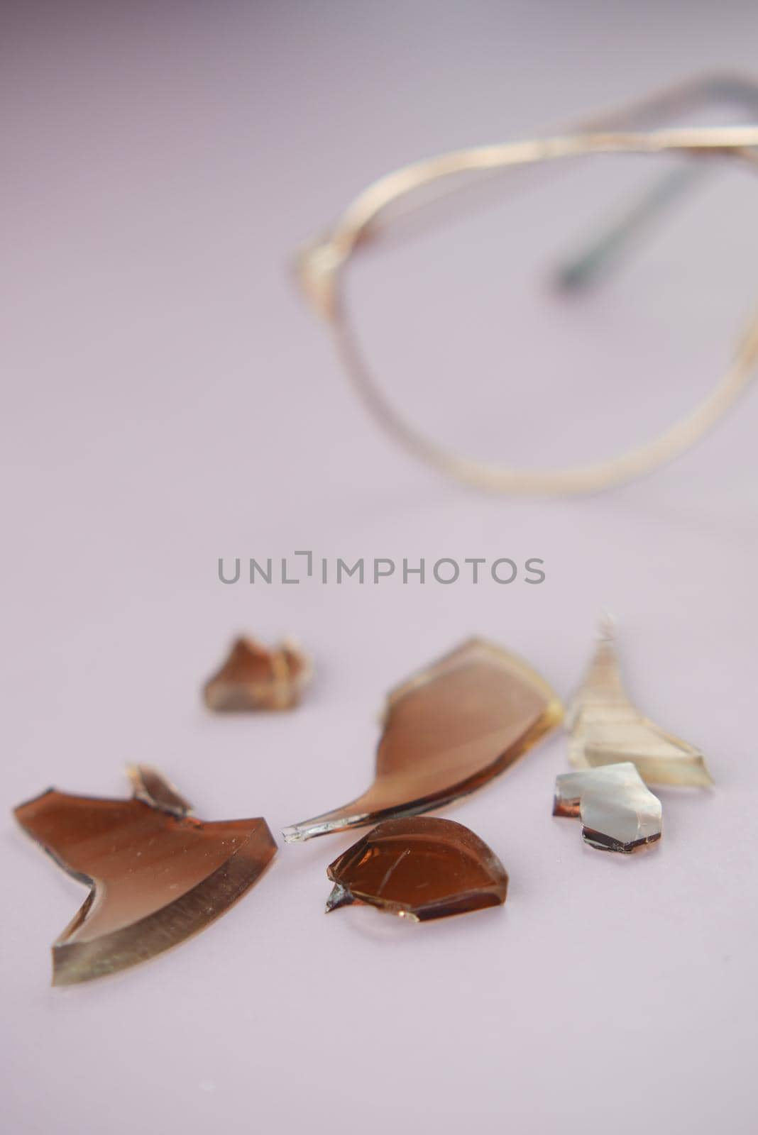 broken eye glass on table with copy space .
