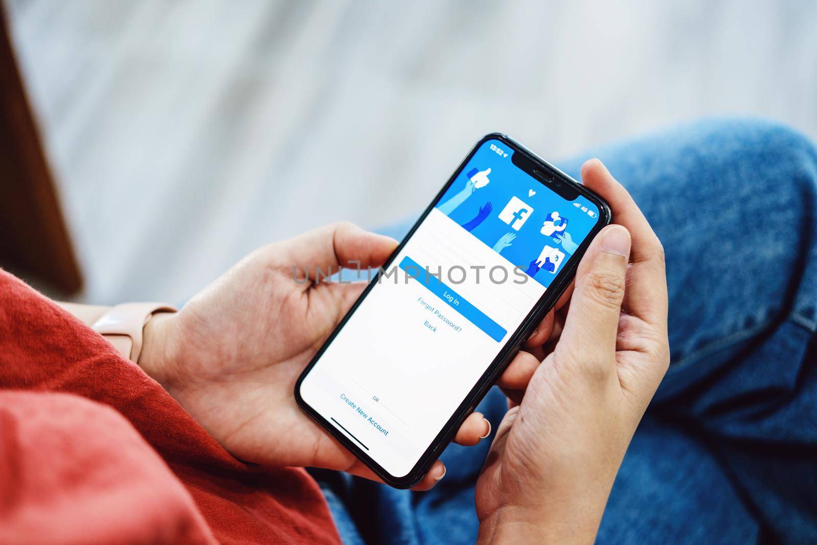 Chiang Mai Thailand. Jan 30, 2020. Woman holds smart phone with facebook application on the screen. facebook is a photo-sharing app for smartphones