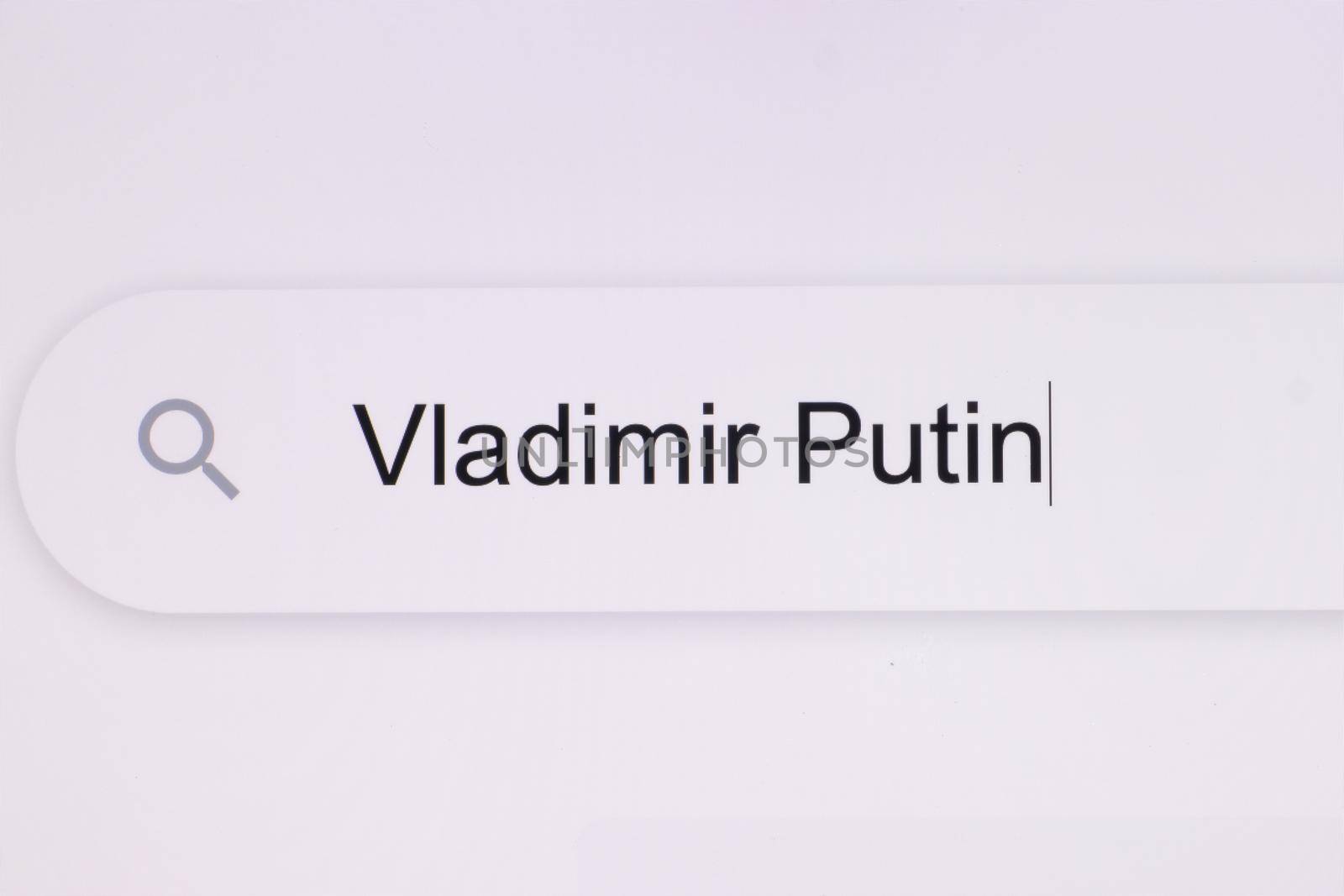 Close Up of searching for Vladimir Putin on the Internet. Russian Federation attacked Ukraine. Typing text Vladimir Putin by uflypro