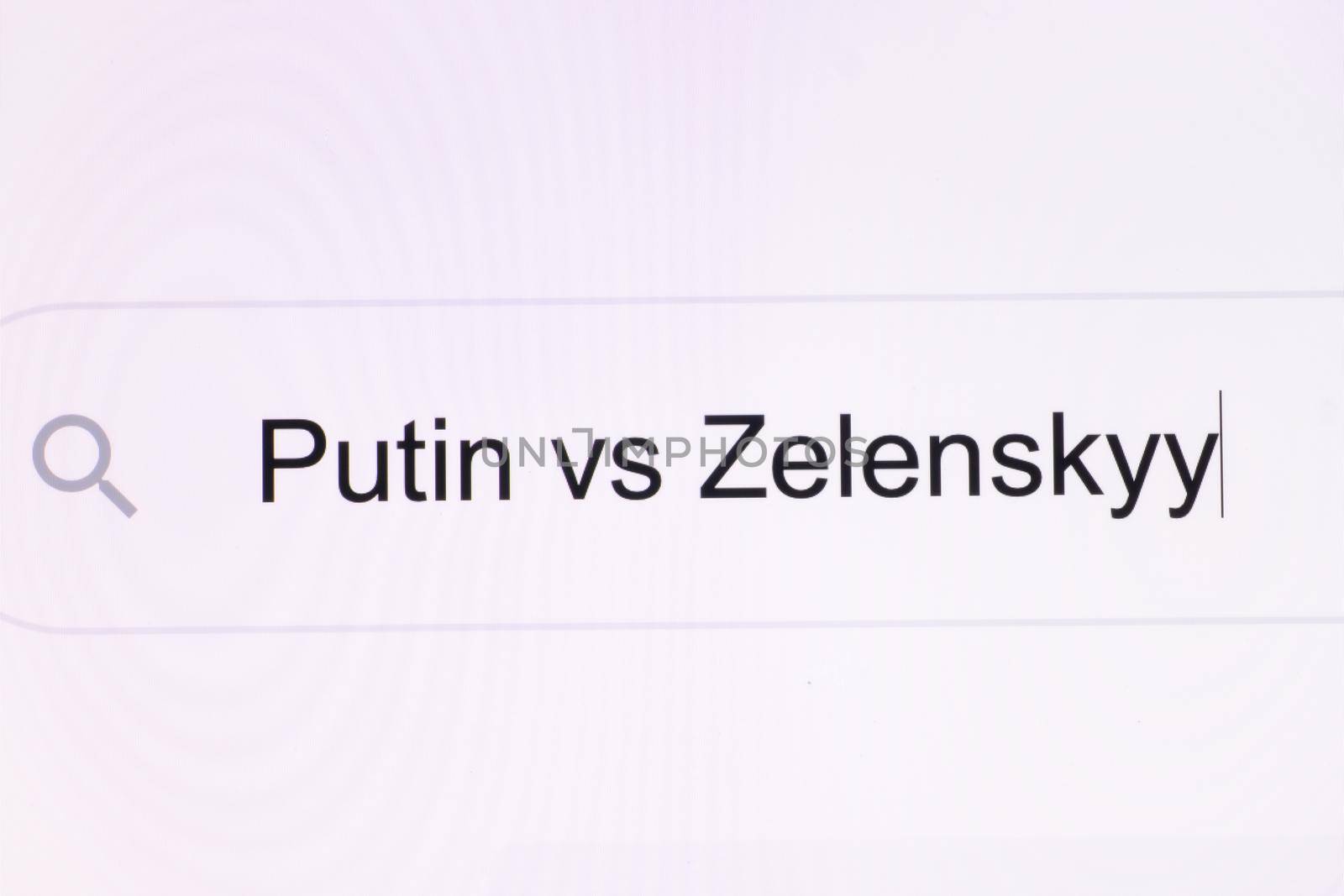 Close Up of searching for Putin vs Zelensky on the Internet. Putin vs Zelensky headline titles across international media in white background. President of Ukraine Volodymyr Zelensky vs Putin Russia. by uflypro