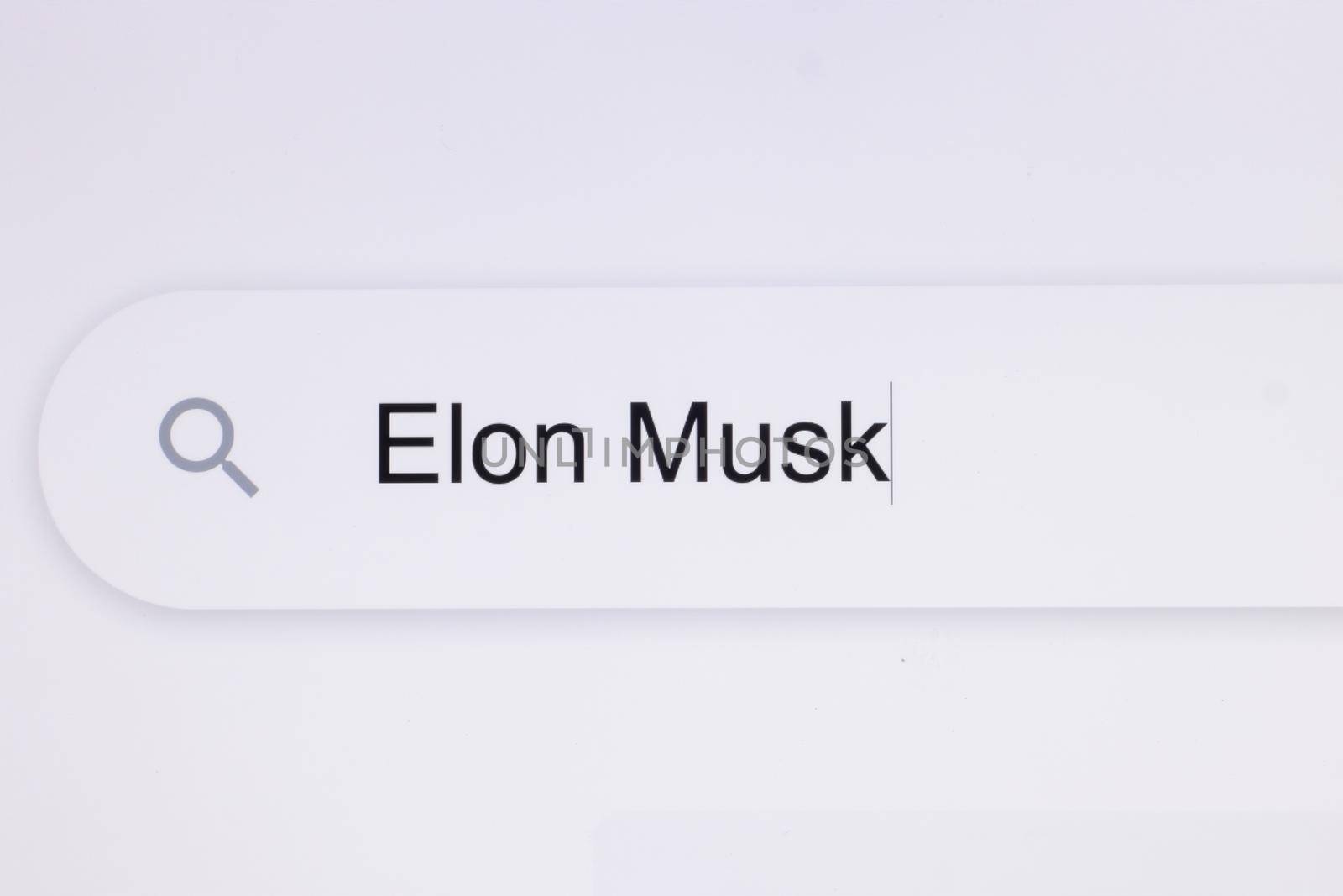 Typing Elon Mask Into Address Bar. Searching For an Online Network Website. Searching The World Wide Web Internet on a Computer. Monitor Screen View of Search for a Webpage by uflypro