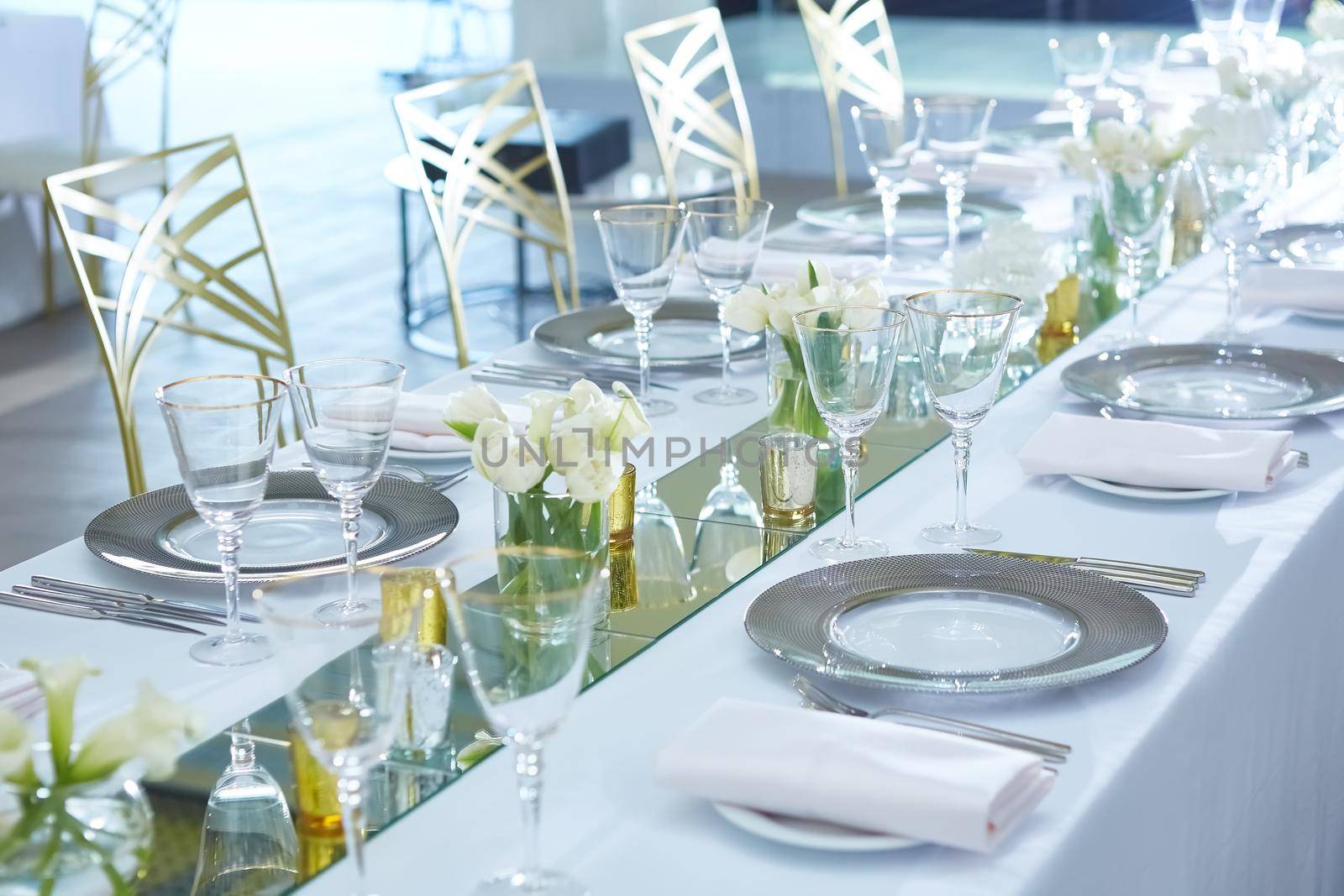 Beautifully organized event. Served festive table ready for guests. Shallow doff